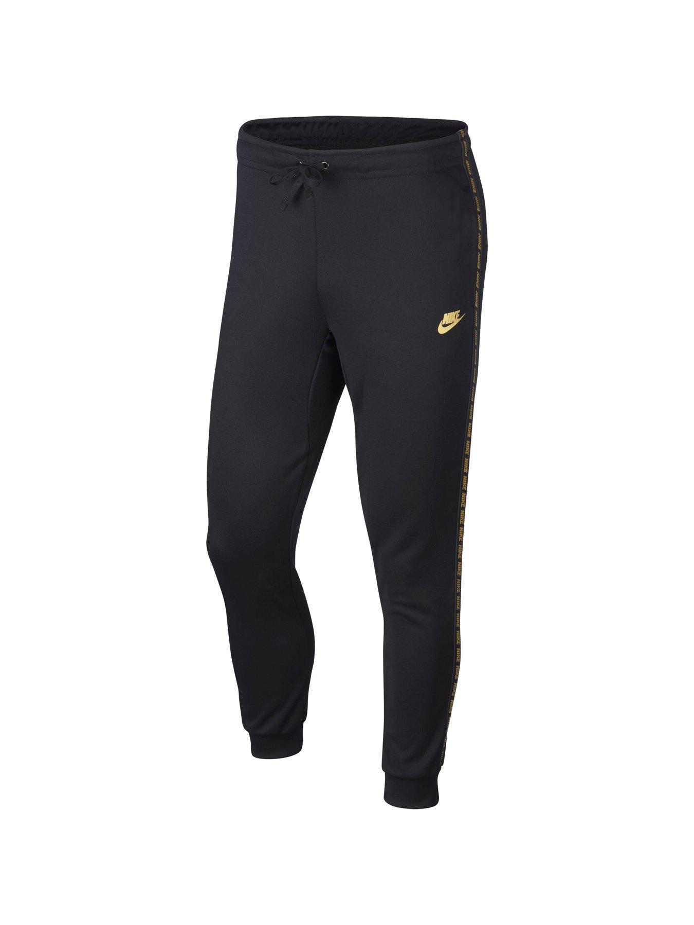 gold nike joggers
