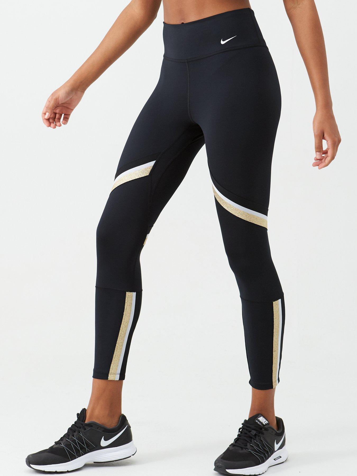 white and gold nike tights