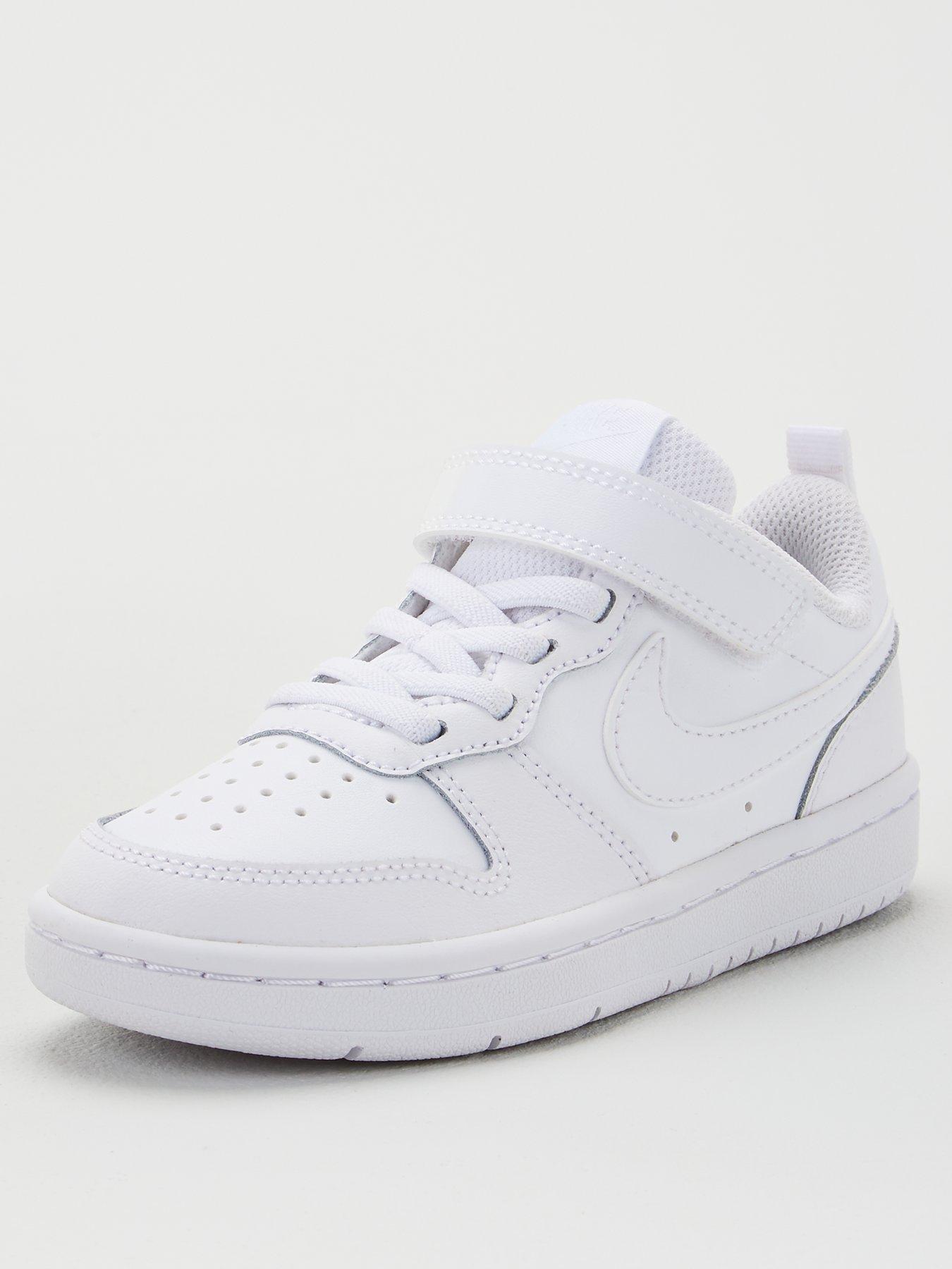 white kids nike trainers