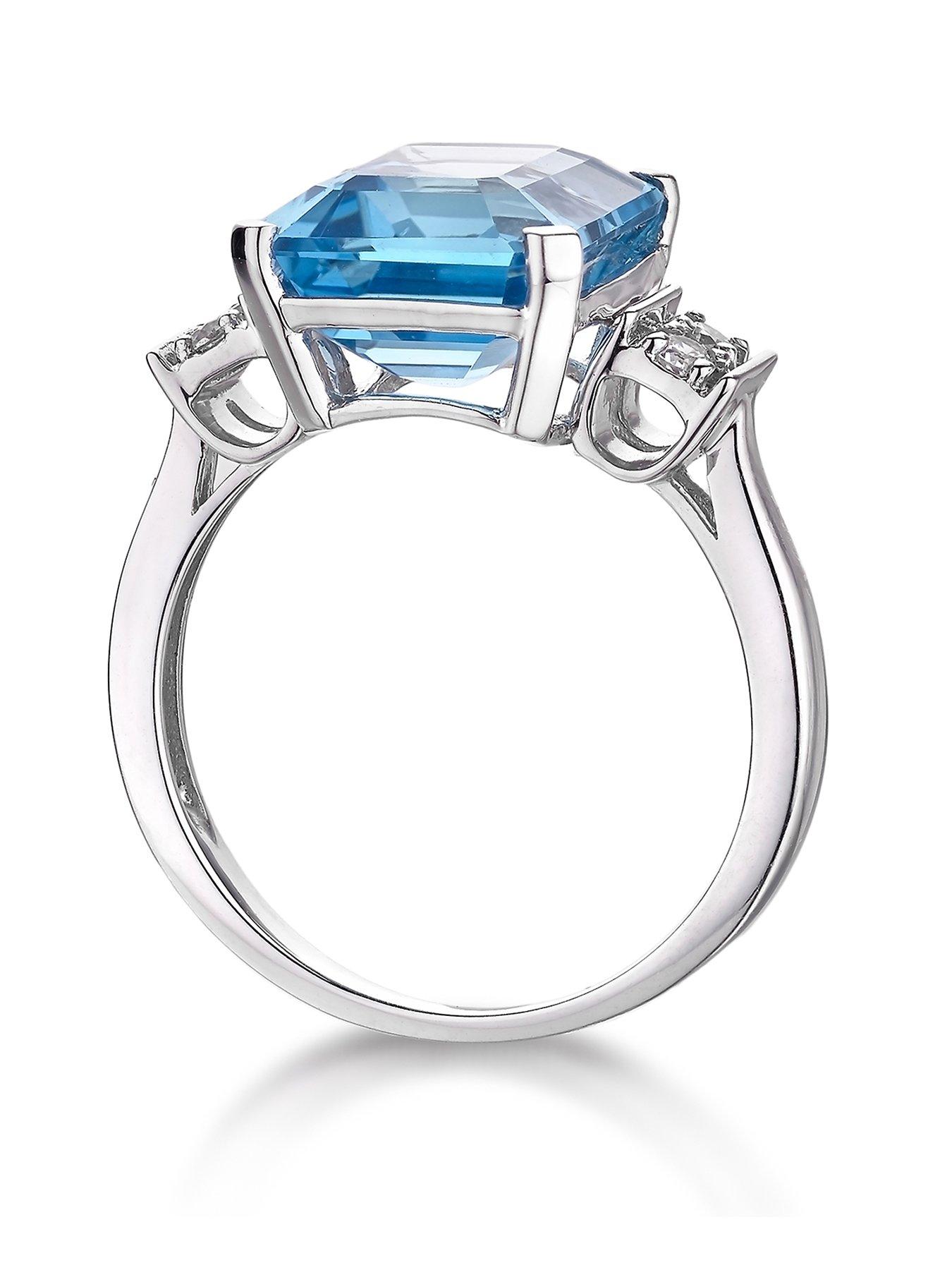 The Love Collection 9ct White Gold Blue Topaz Emerald Cut Ring