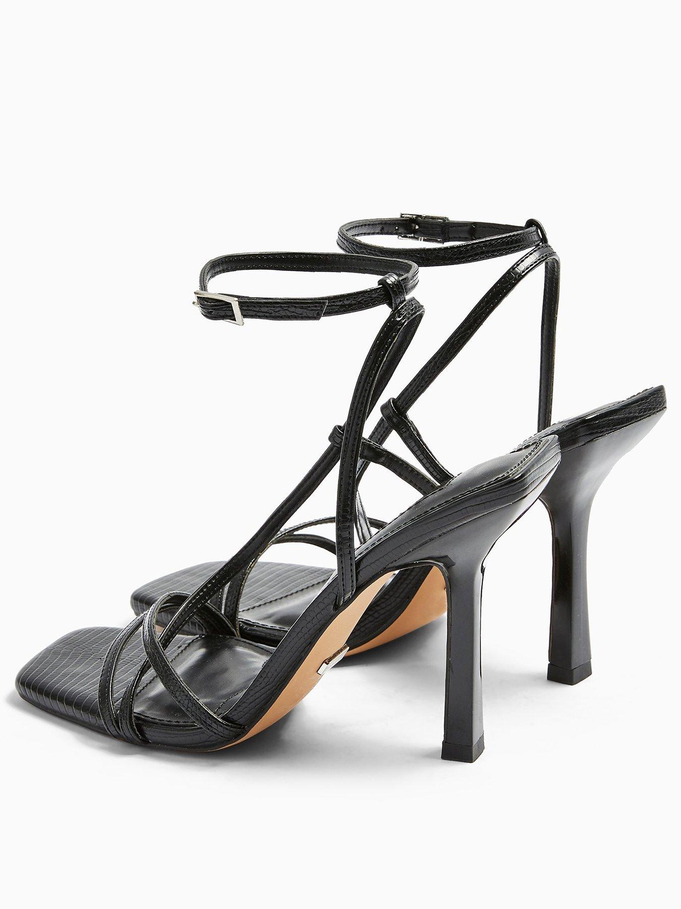 very strappy heels