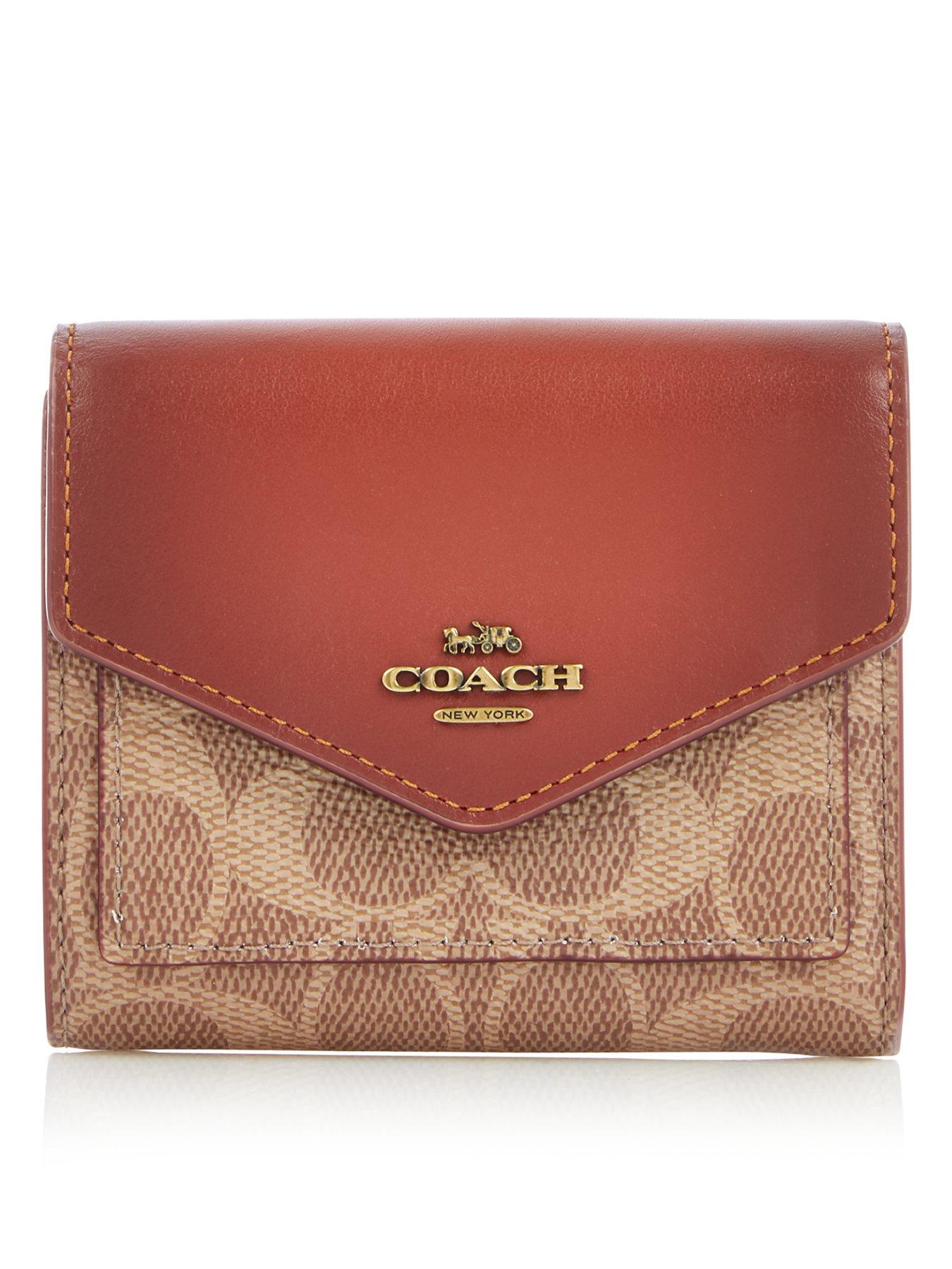 small tan coach purse