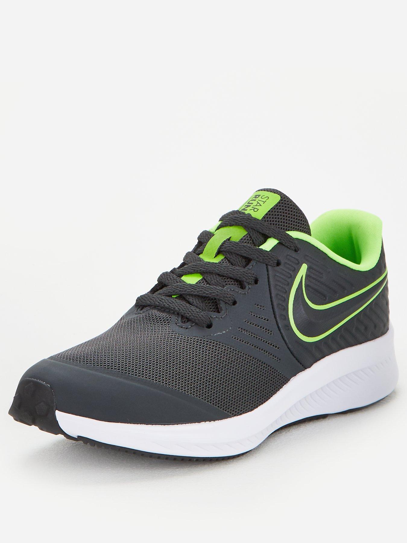black and green nike trainers