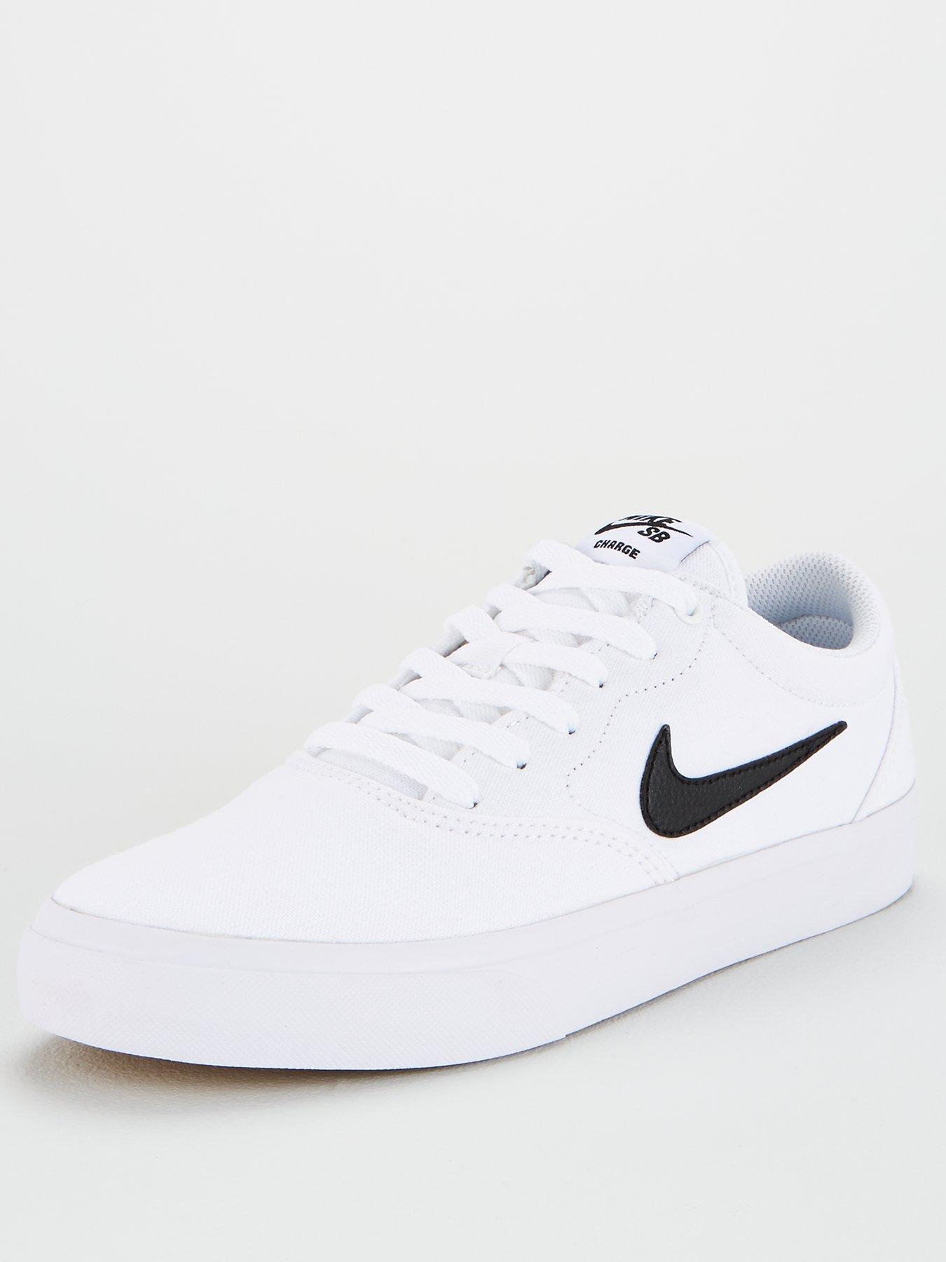 nike sb charge canvas sneakers in white