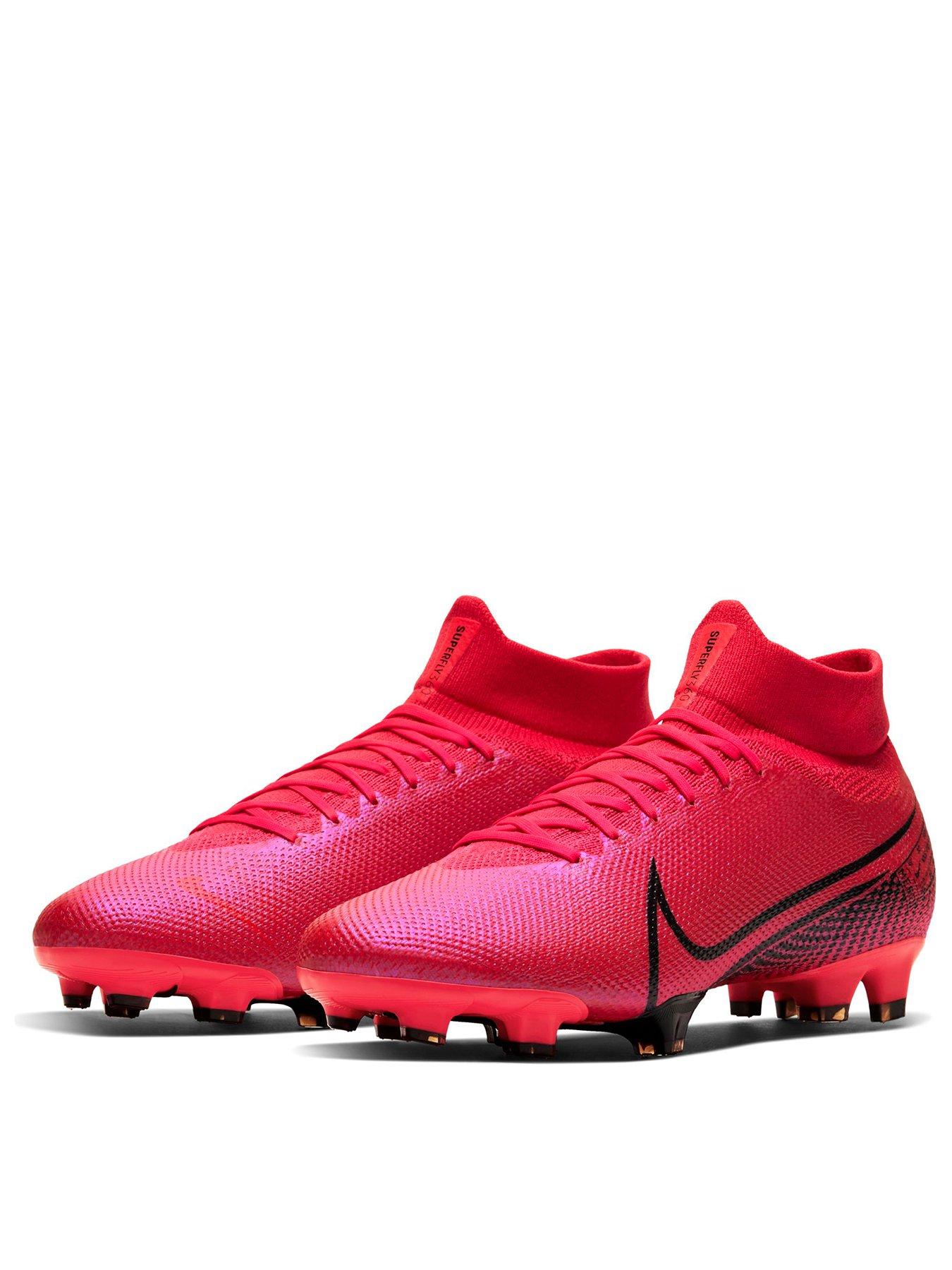 red and black football boots