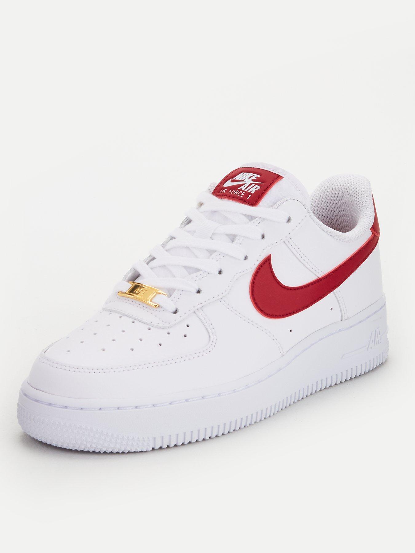 nike white trainers with red tick