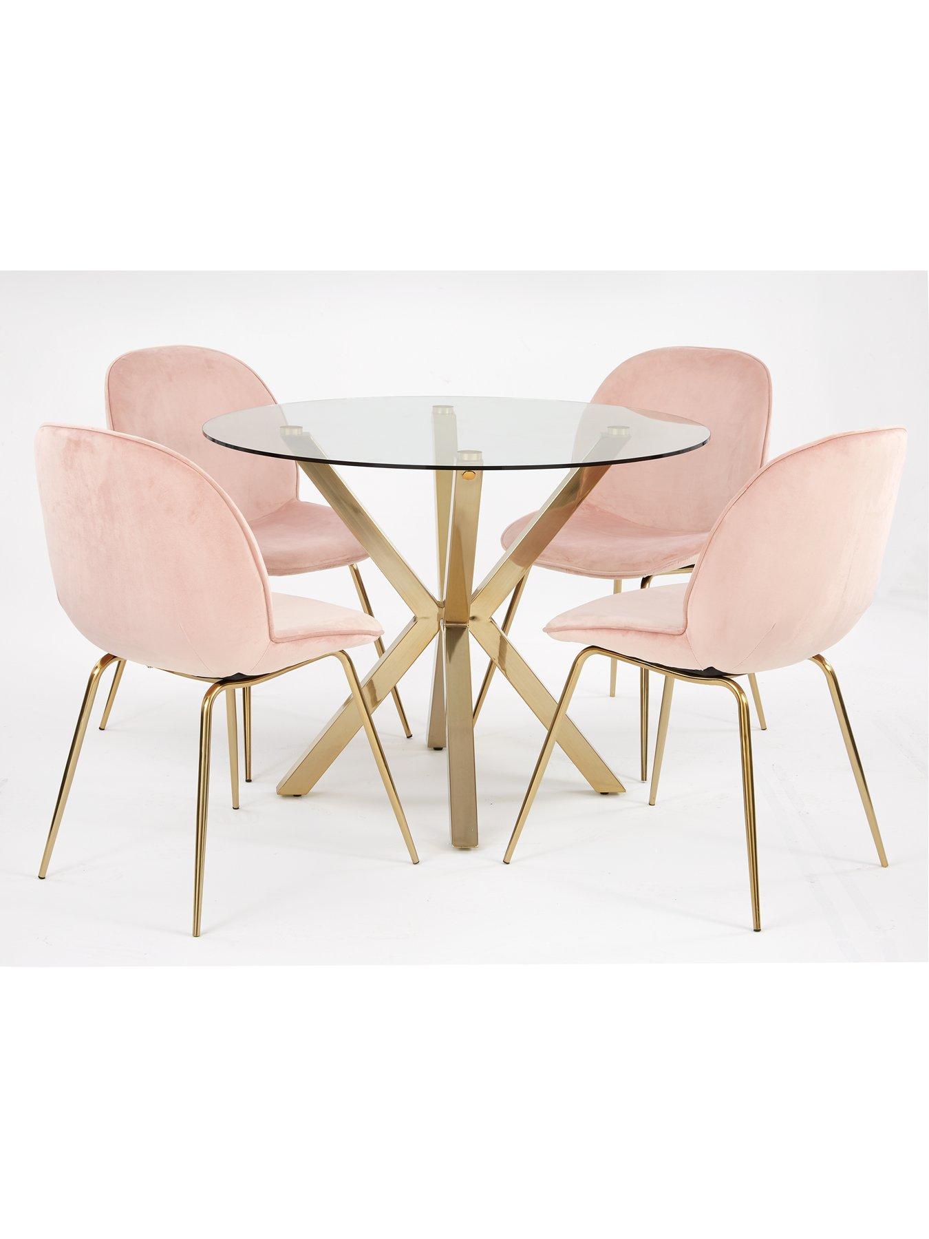 Round table and store pink chairs