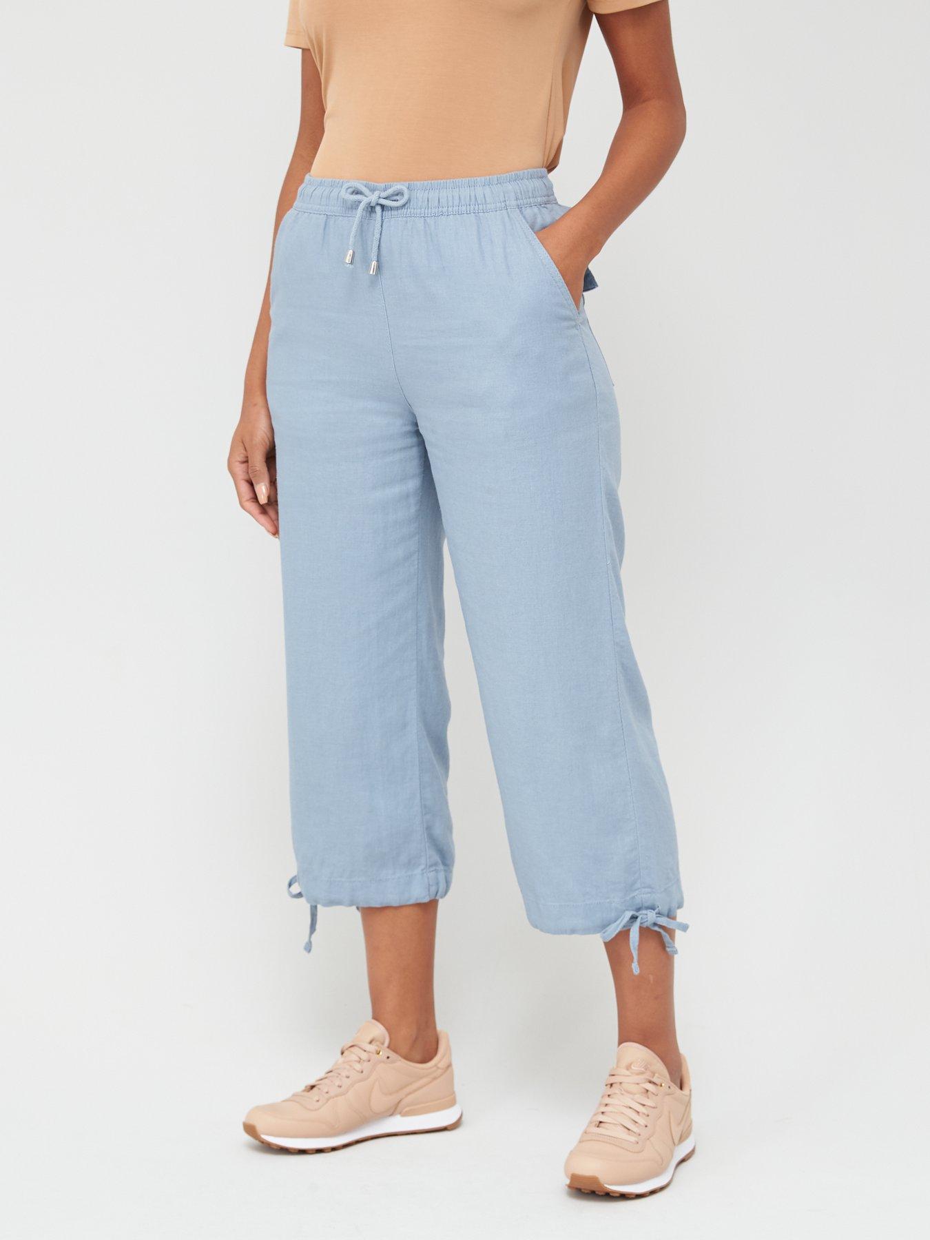blue cropped trousers