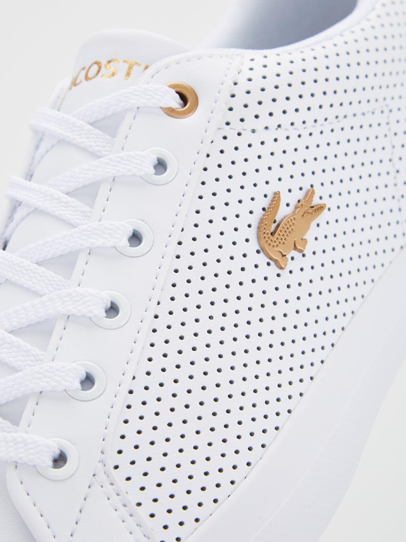 lacoste white and gold trainers