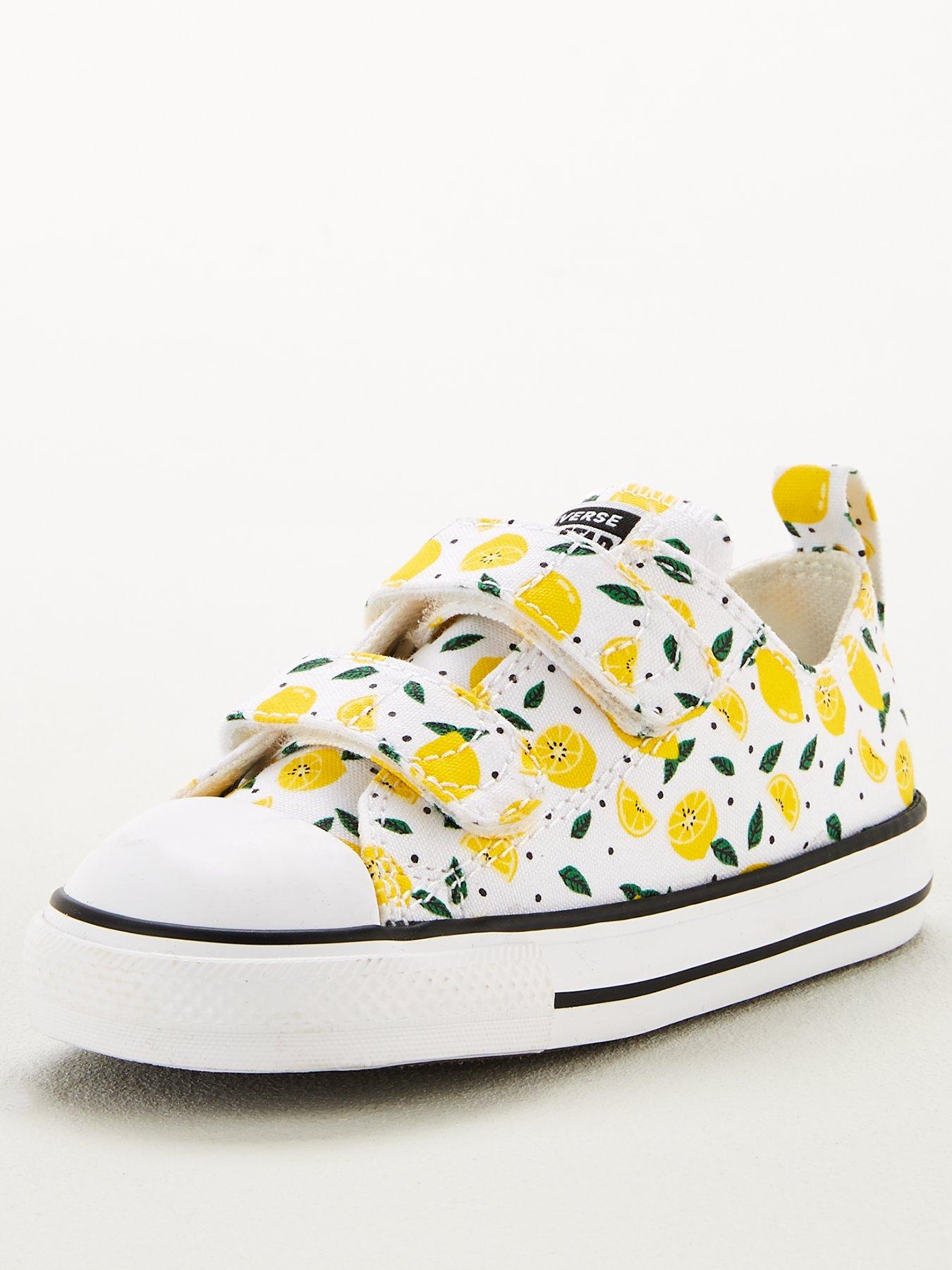 yellow infant converse