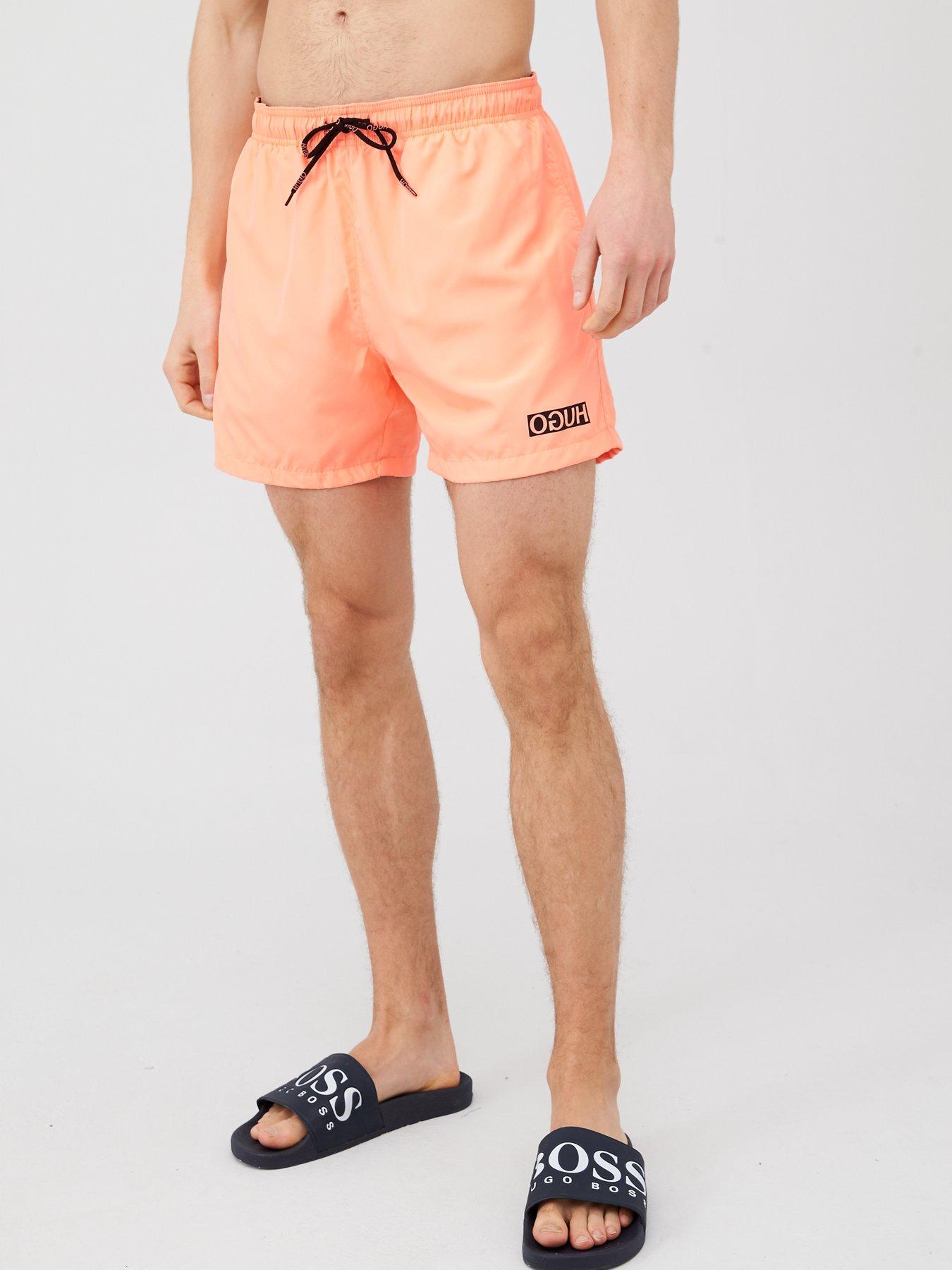 peach swim shorts
