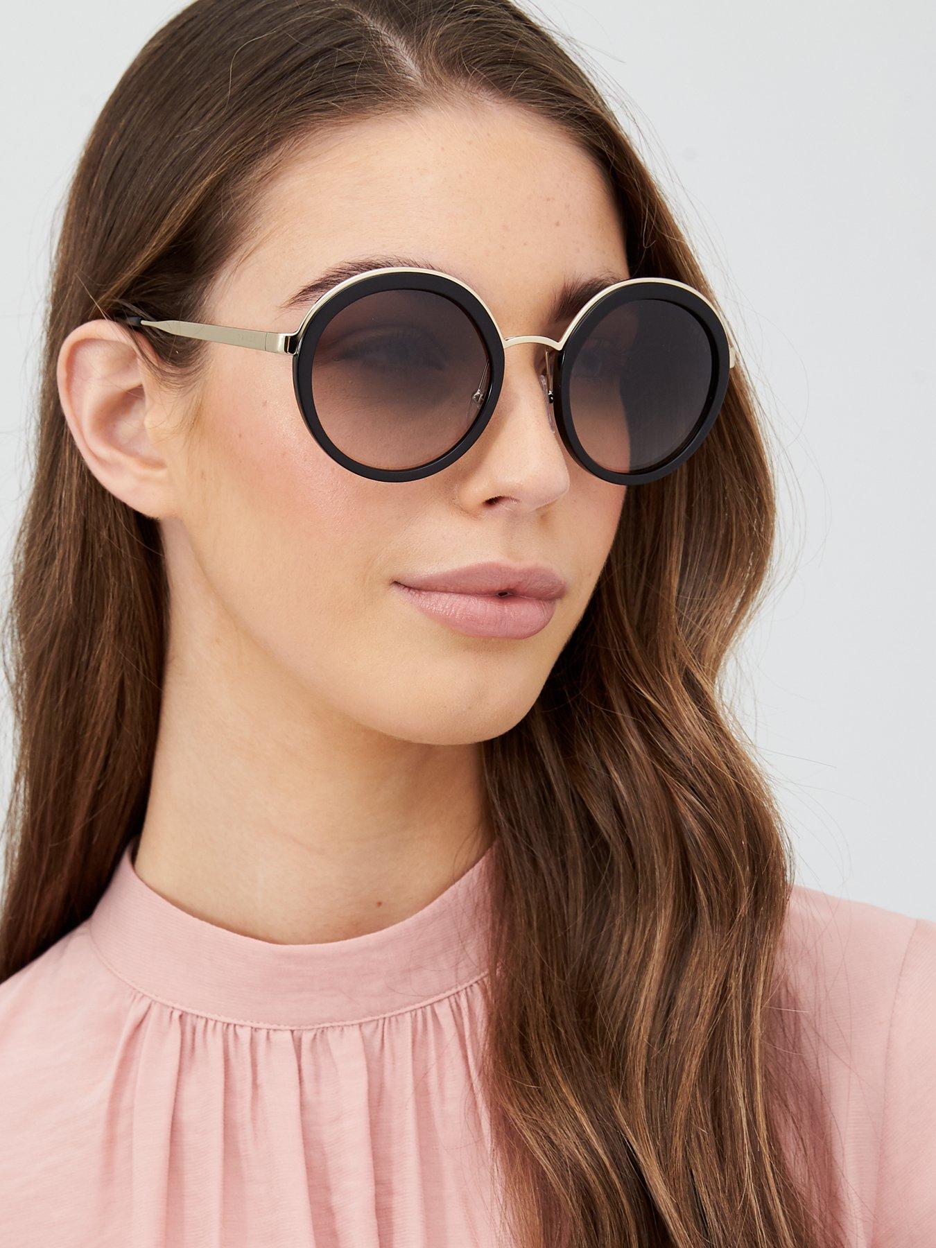 prada round sunglasses black