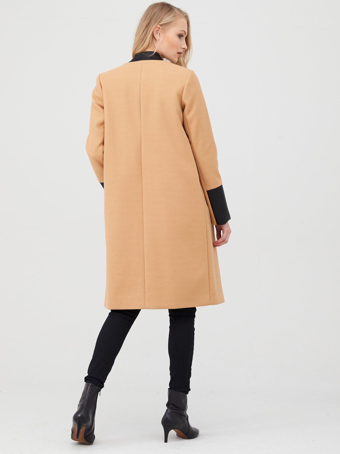 collarless camel coat