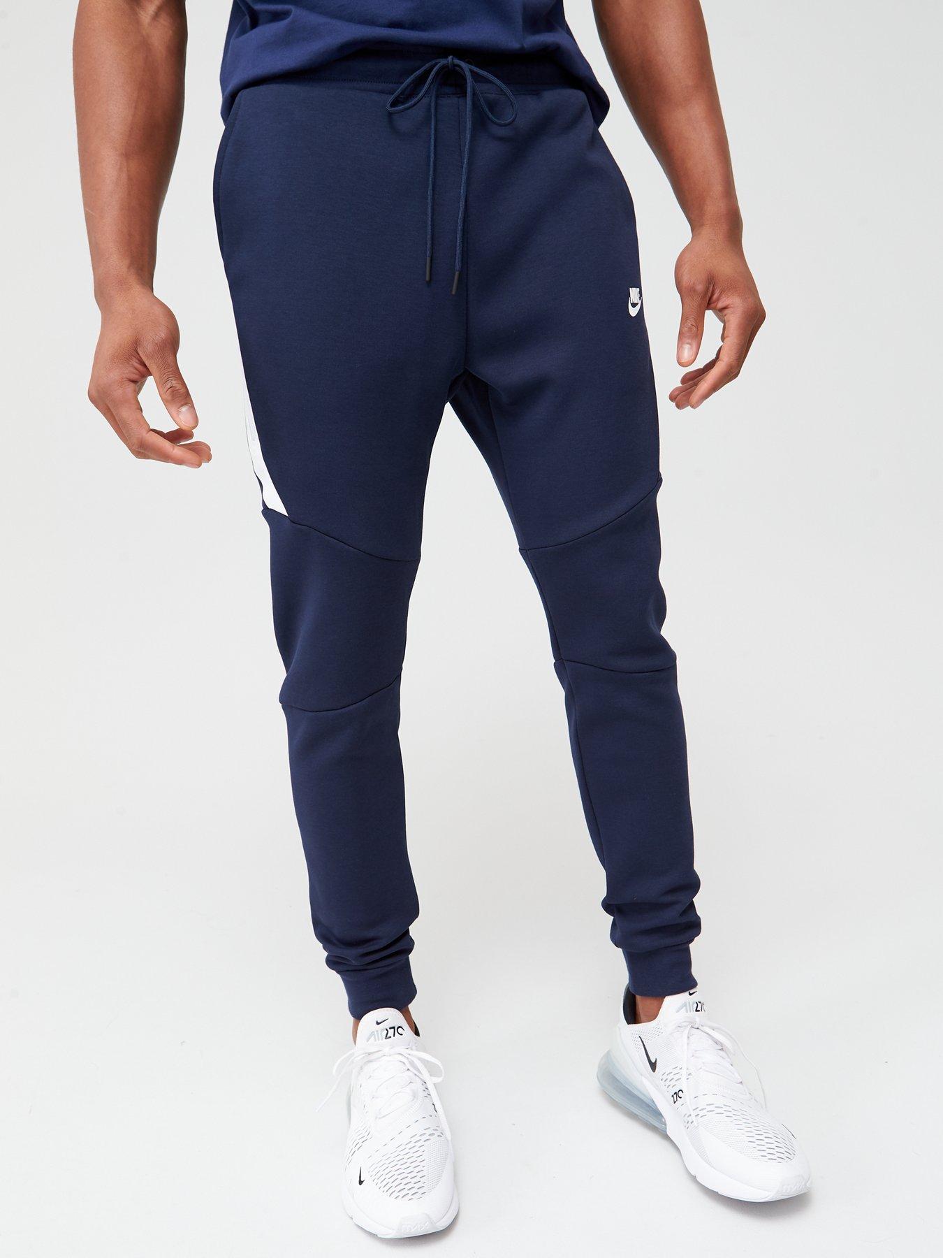 navy blue nike tech tracksuit