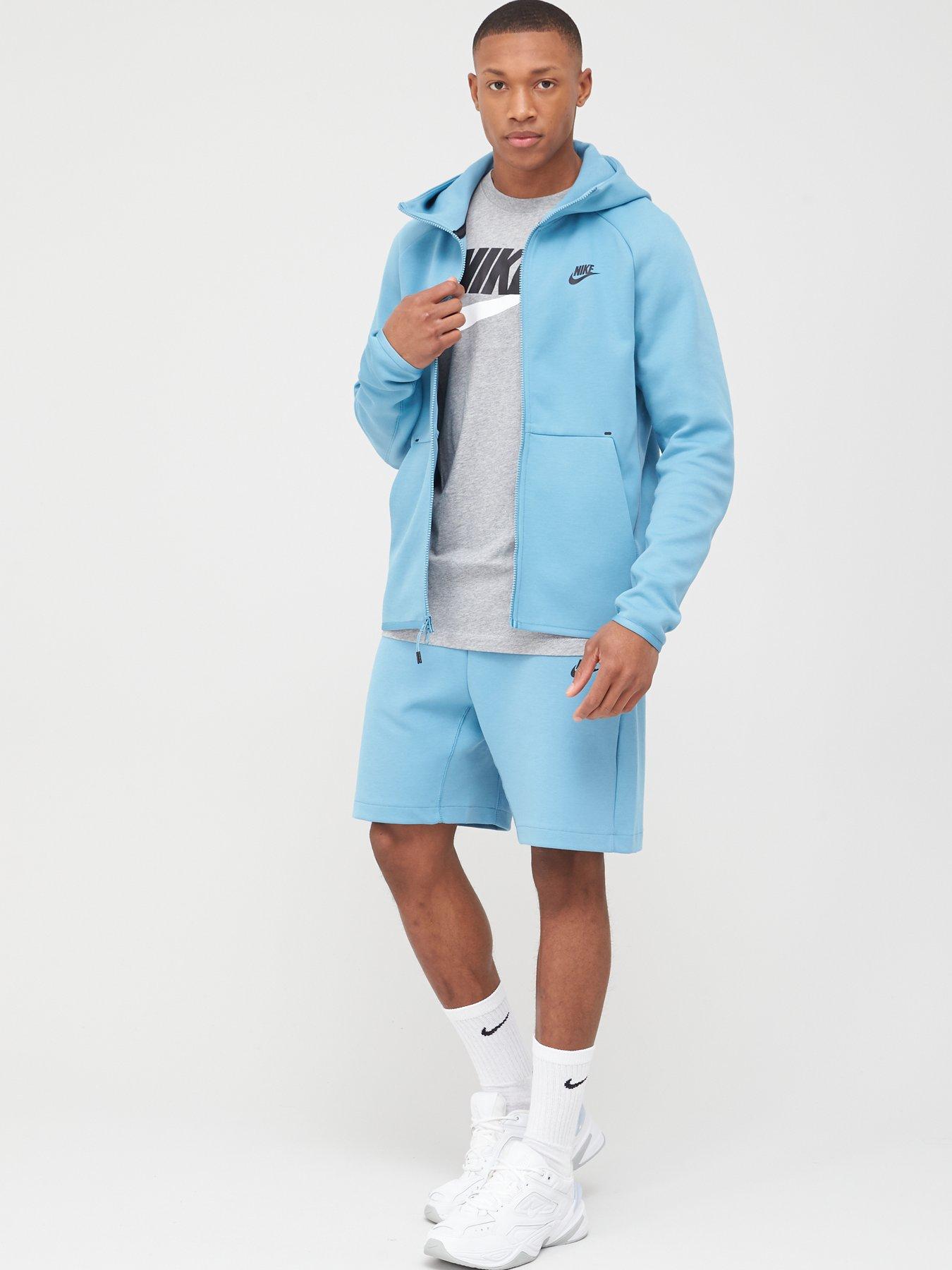 light blue nike tracksuit