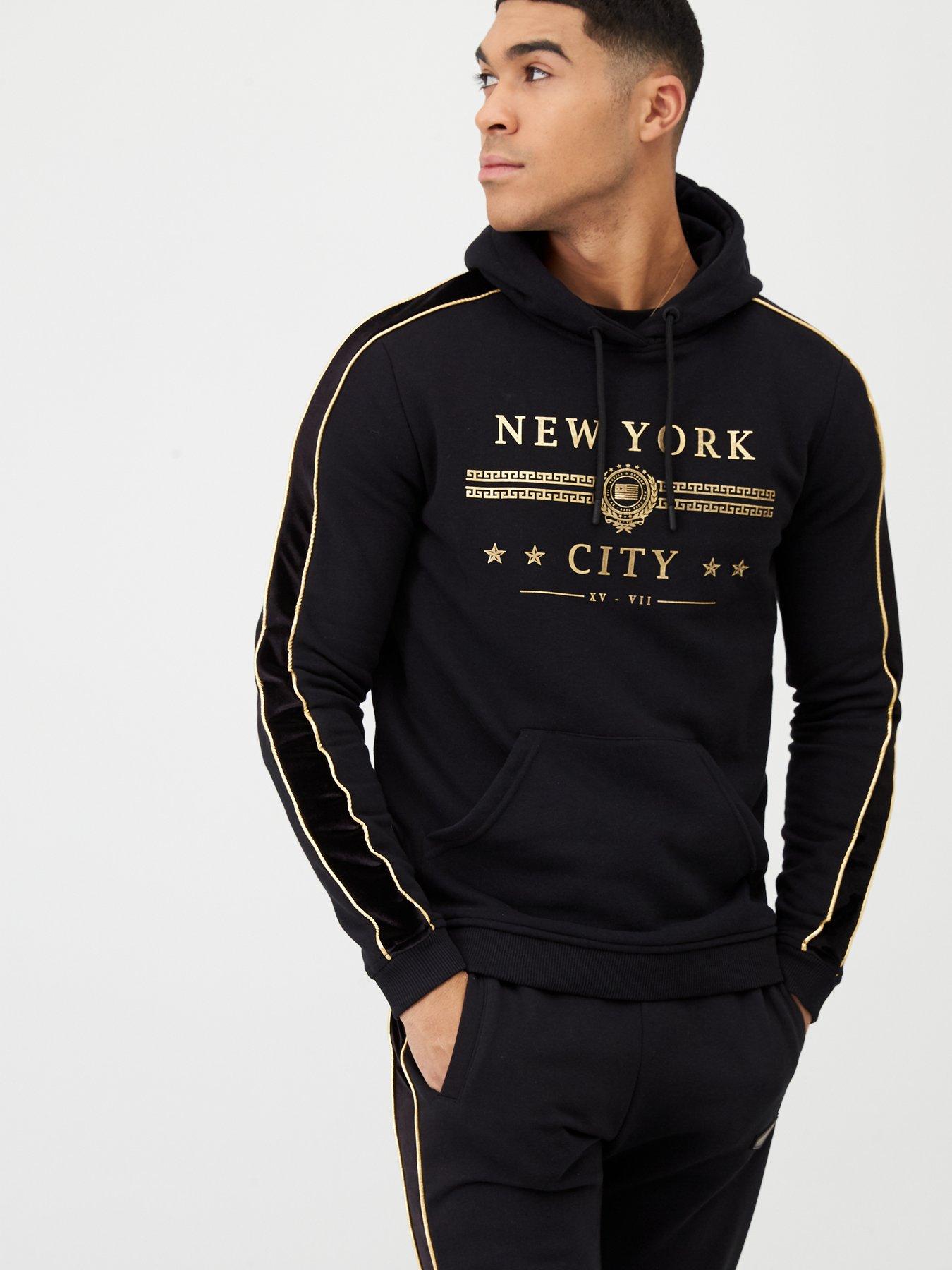 black and gold supply and demand tracksuit
