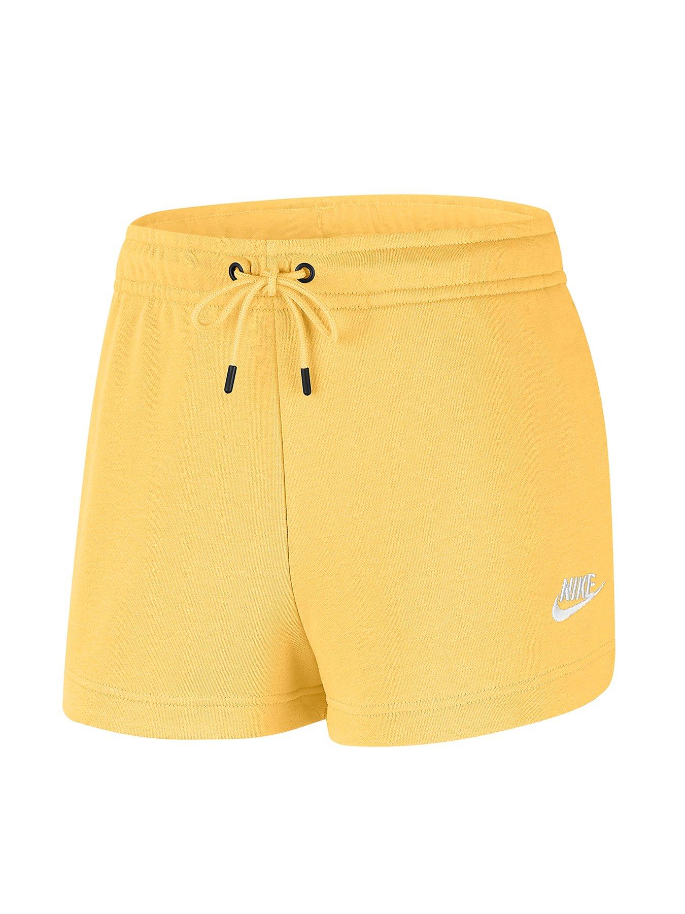 nike essentials shorts in yellow