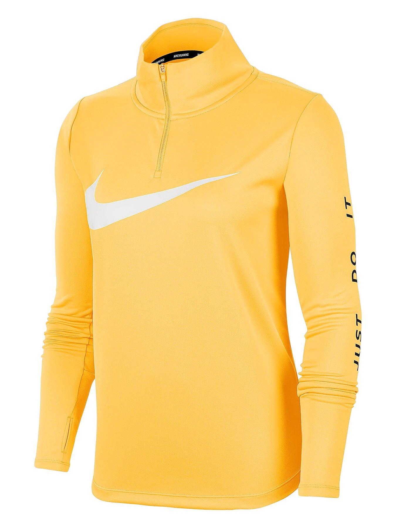 gold nike top