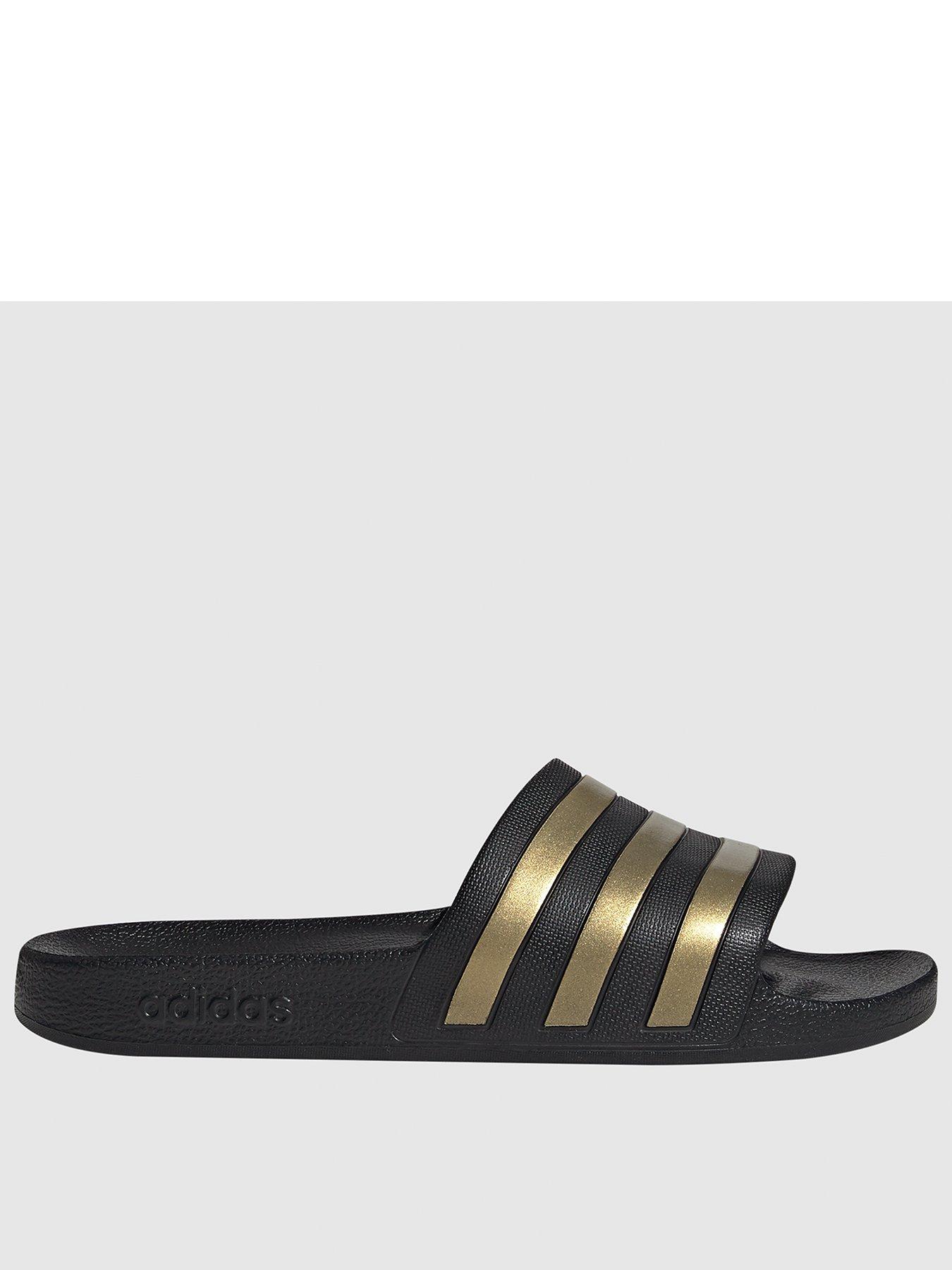 Adidas black and outlet gold slides