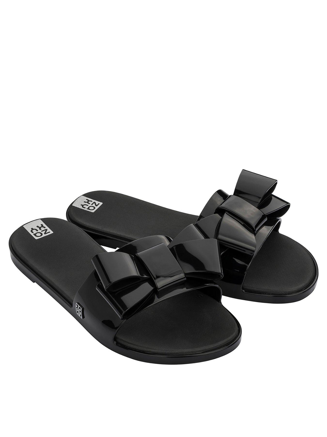black flat sandals with bow