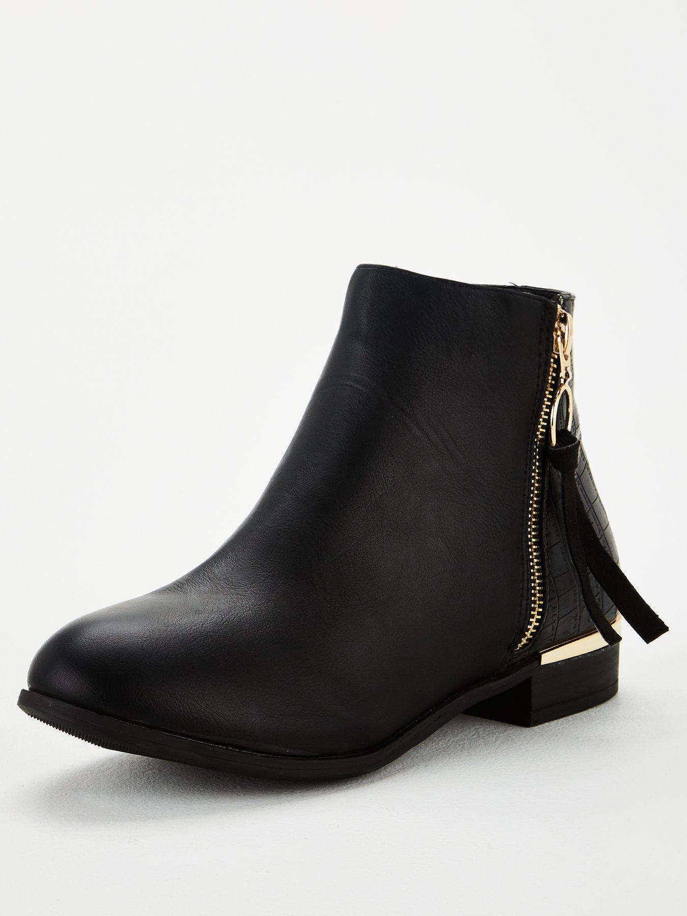 black ankle boots with gold trim