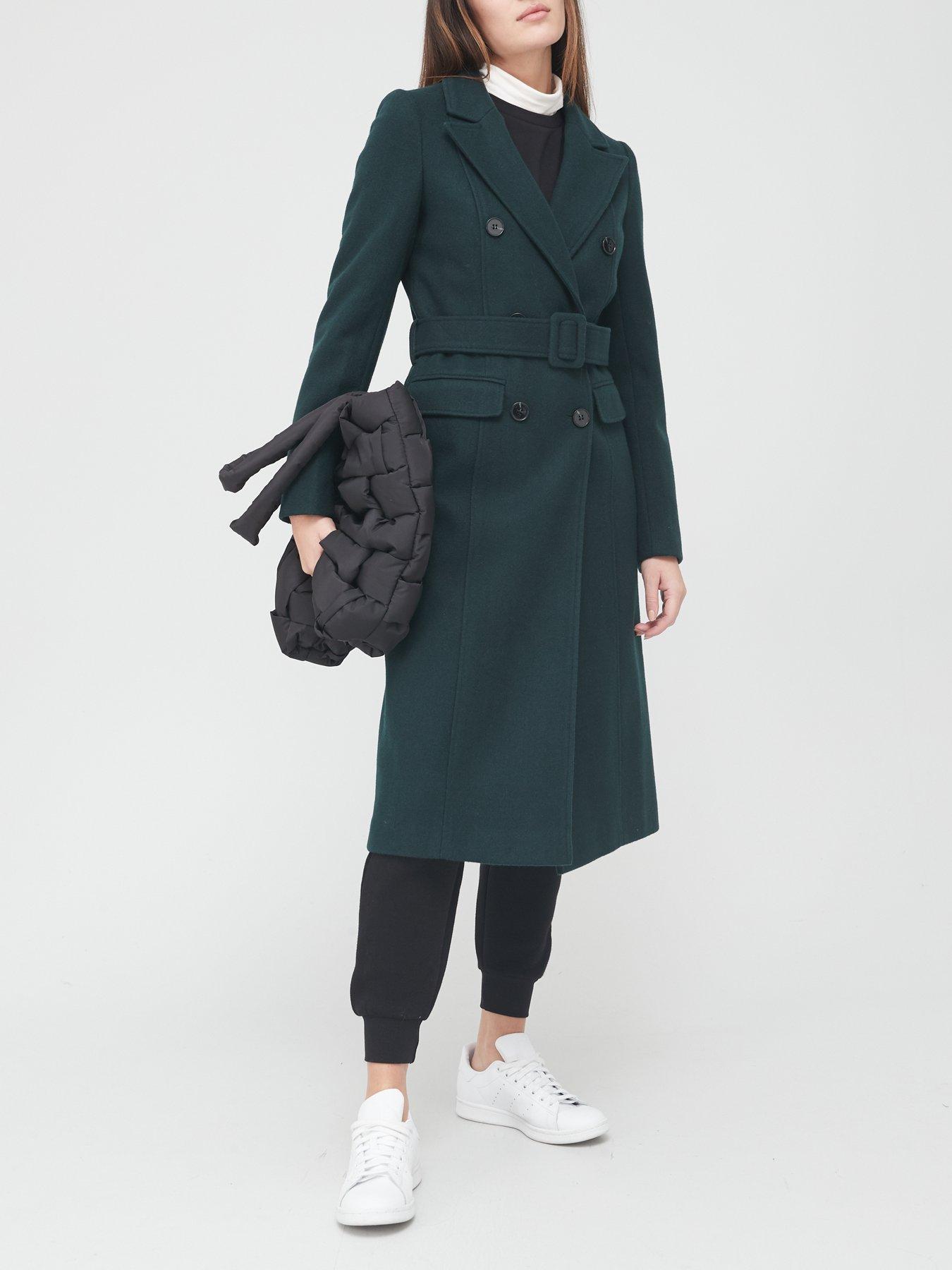 long green belted coat