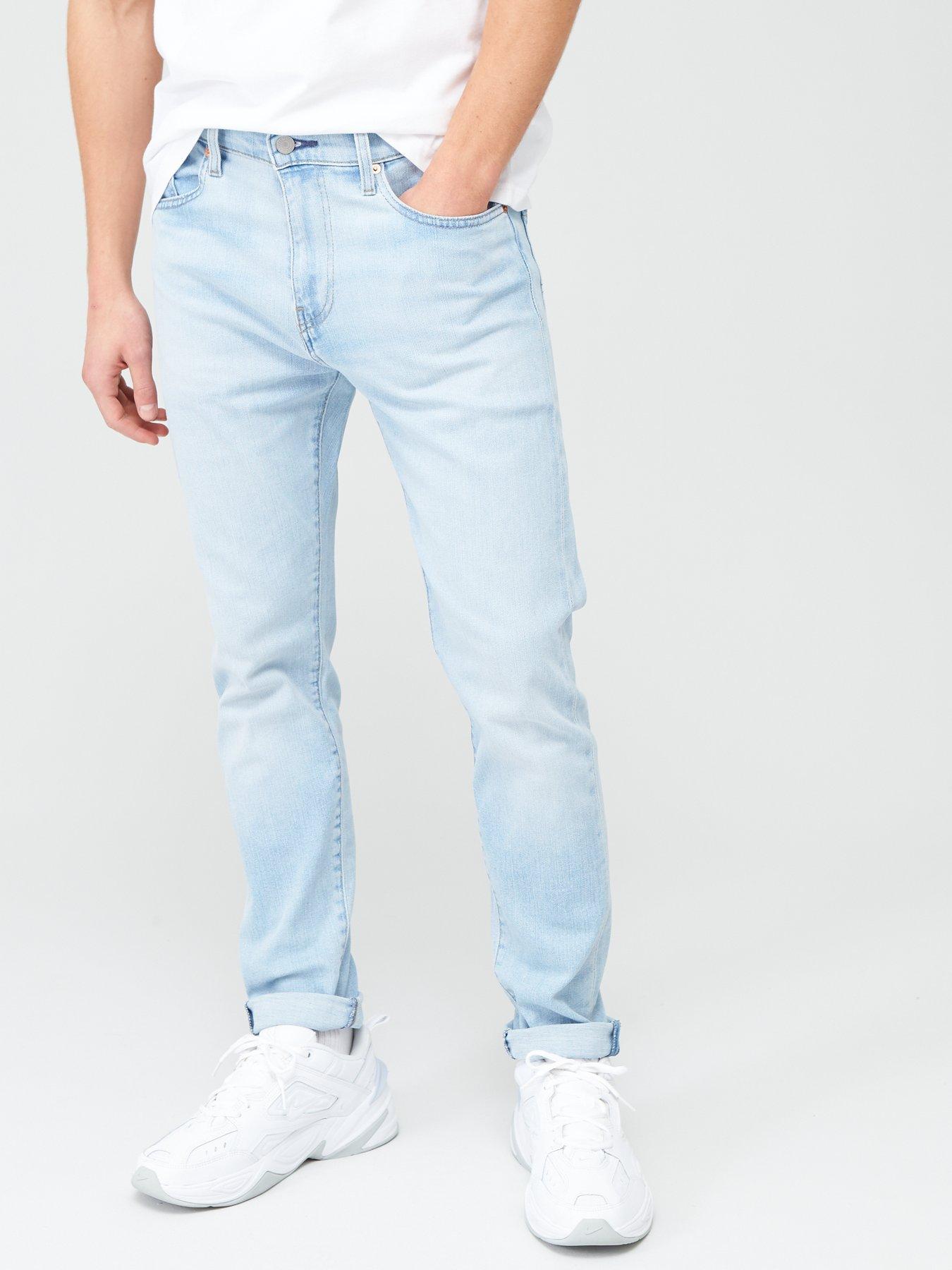 512 slim taper fit warp stretch jeans