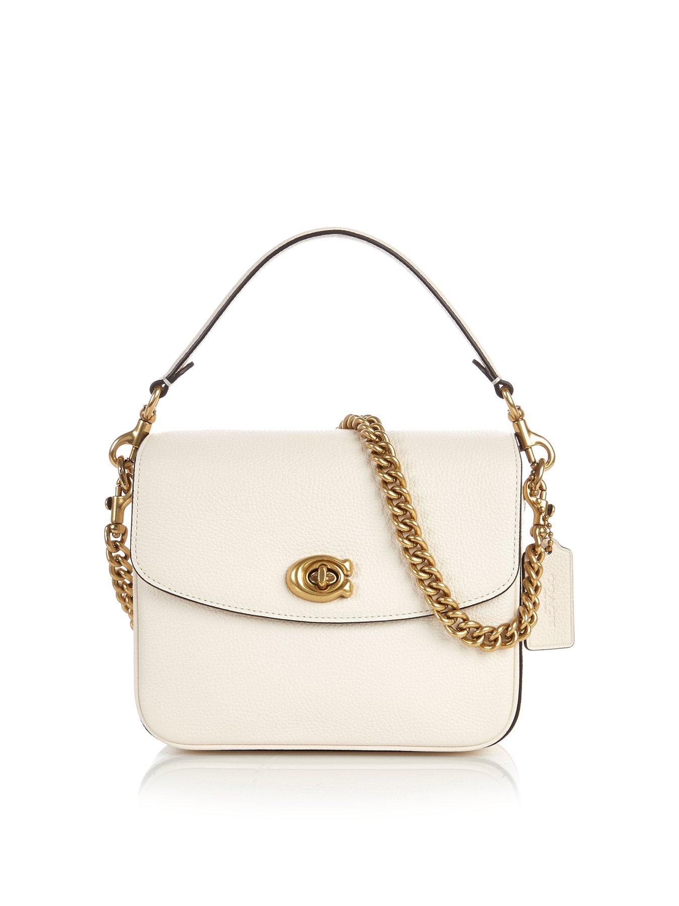 white cross shoulder bag