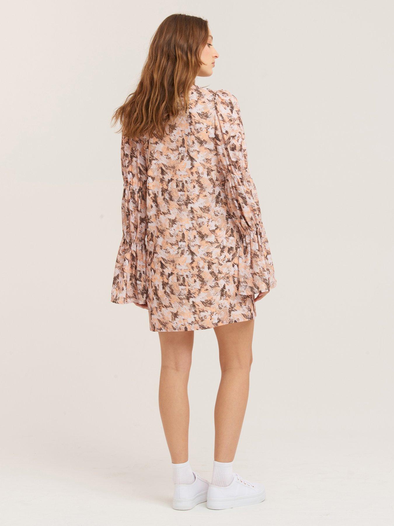 beige shift dress
