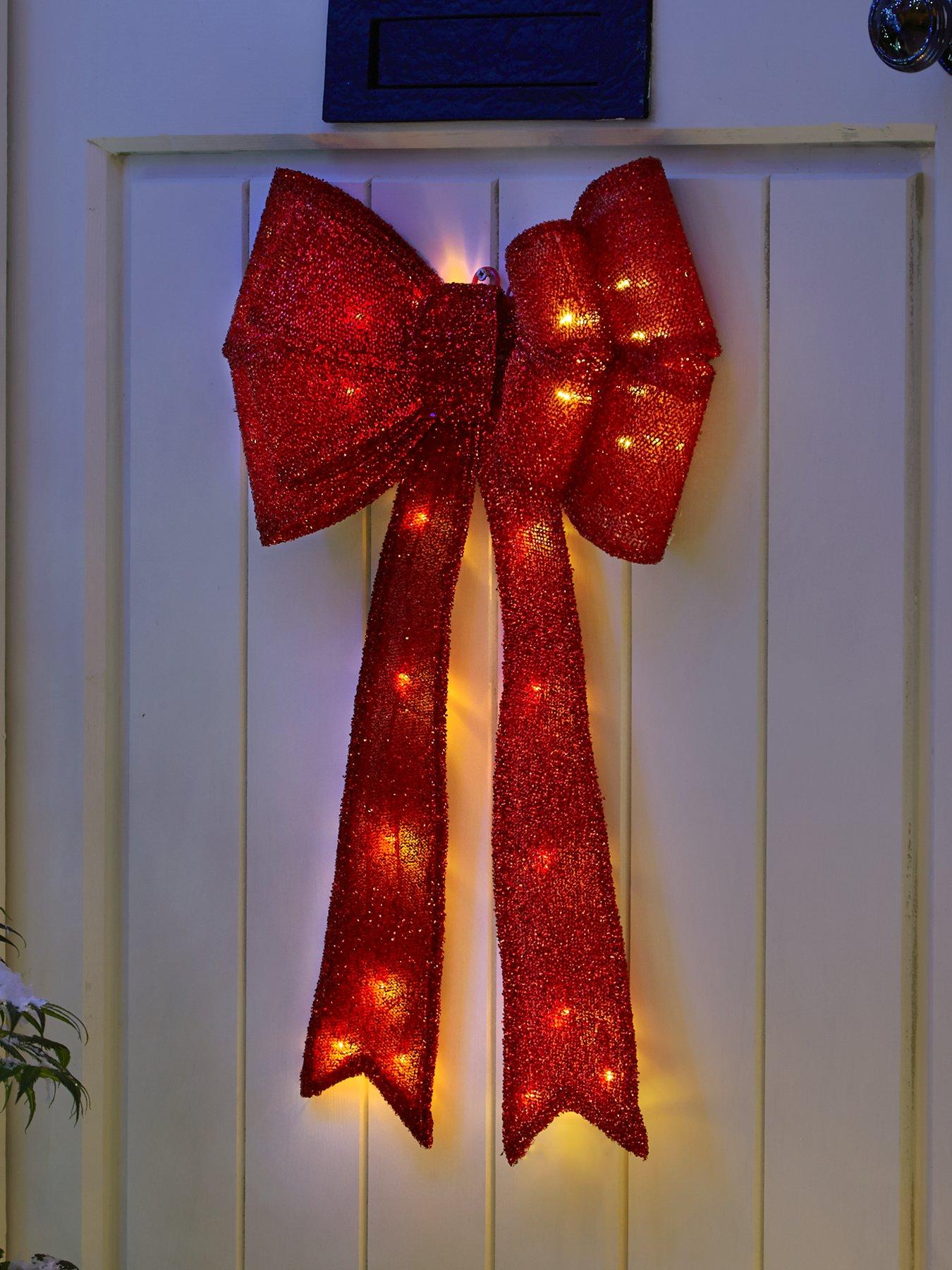 Image 1 of 5 of The Very Collection Battery Operated LED Christmas Door&nbsp;Bow - Red