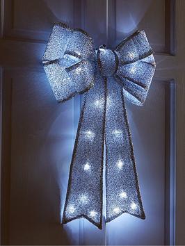 Product photograph of Battery Operated Door Bow Christmas Decoration - Silver from very.co.uk