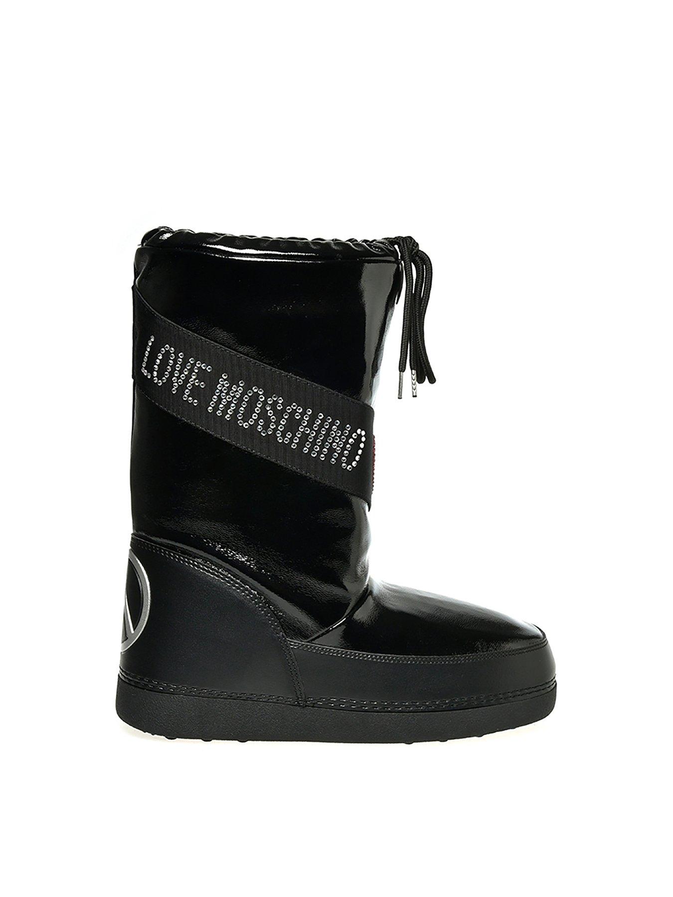 ربط بلطف التكافؤ moschino boots 