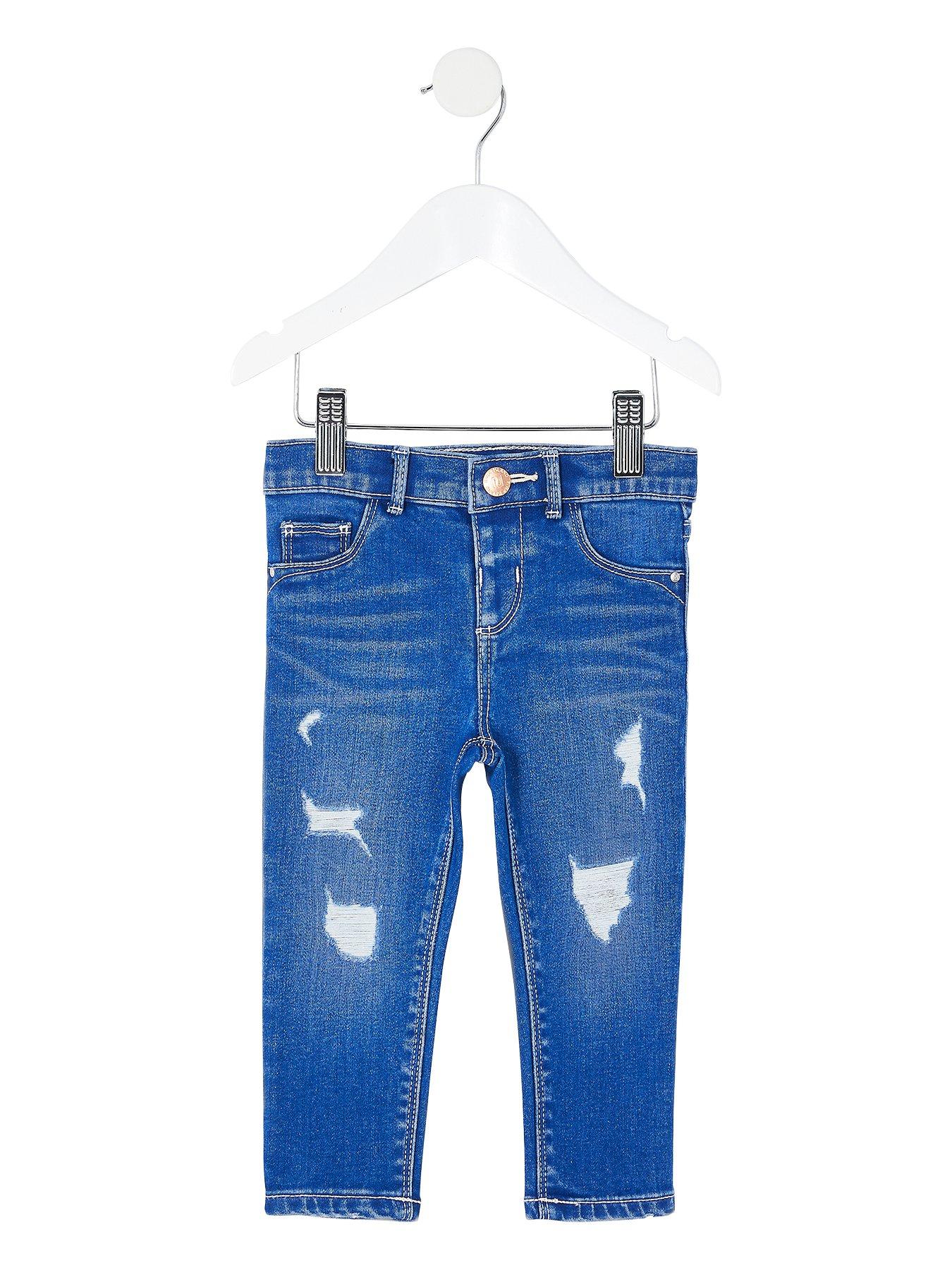 Ripped blue hot sale jeans girls