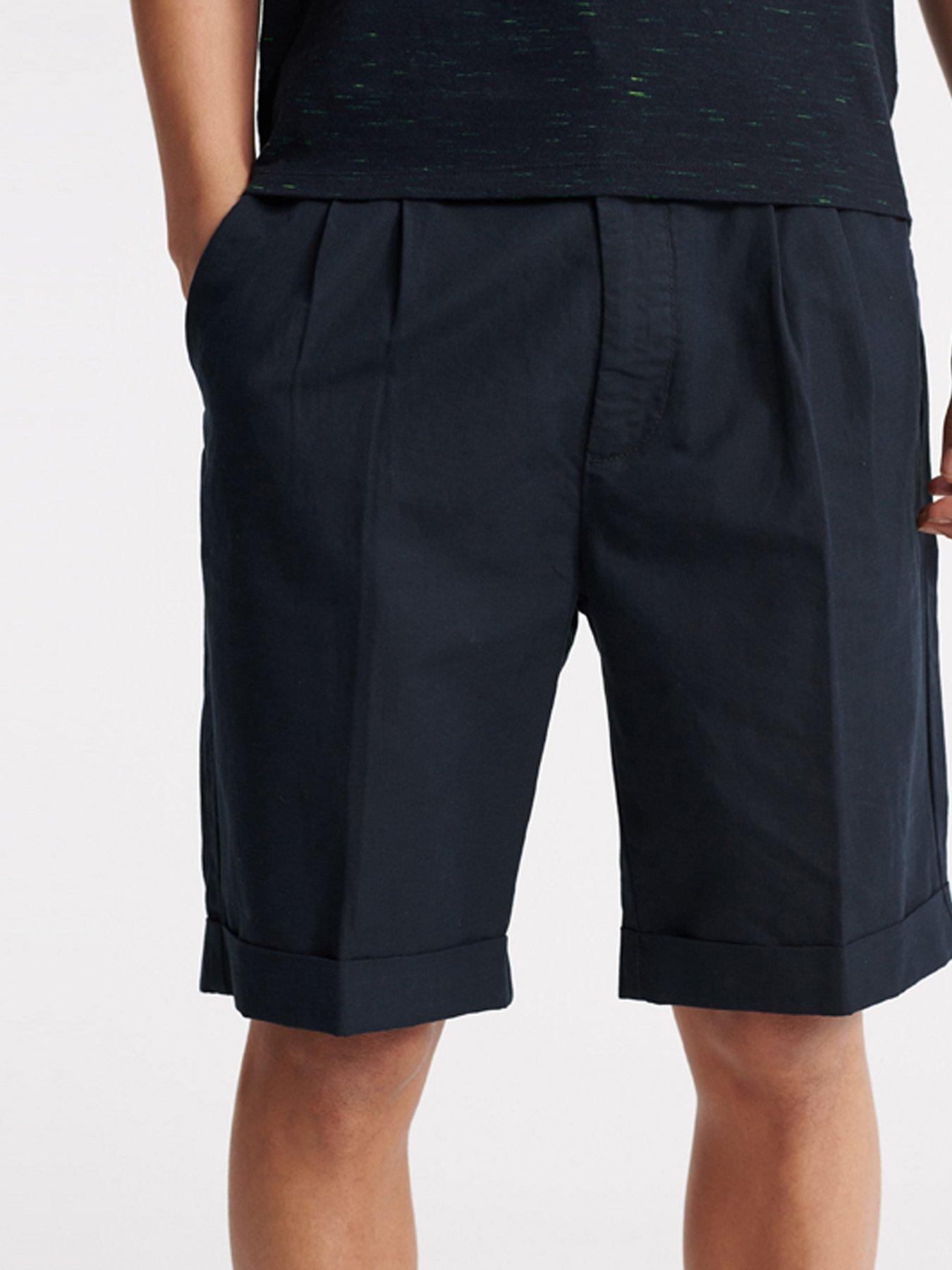 pleated chino shorts