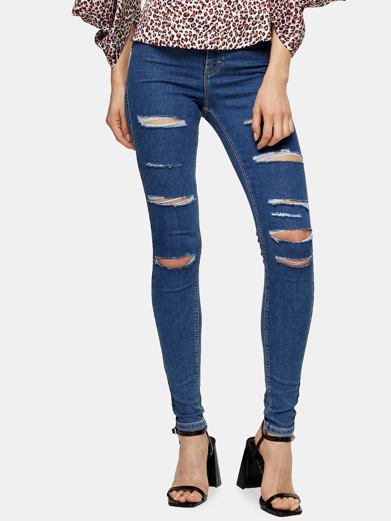 super ripped blue jeans