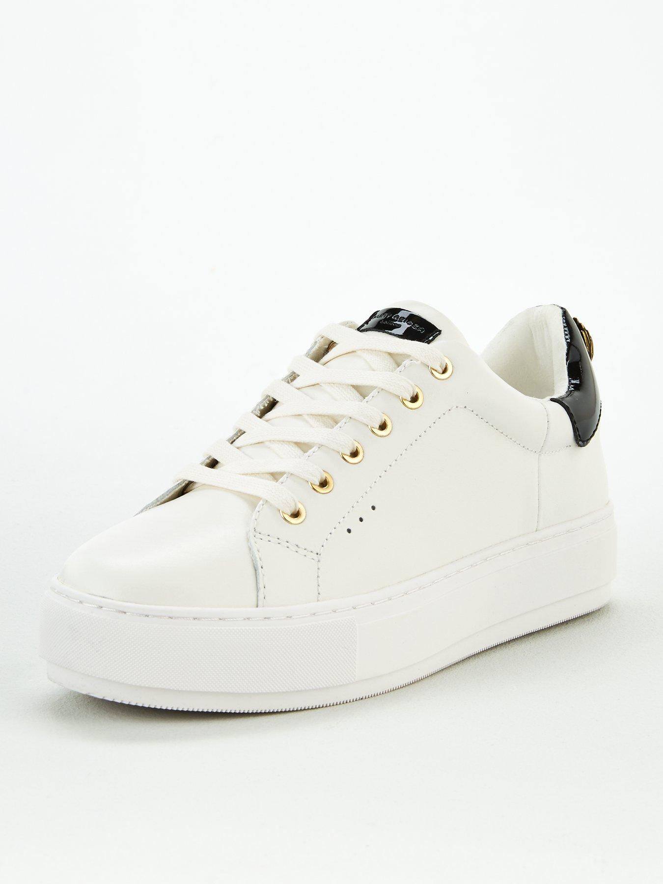kurt geiger black and gold trainers