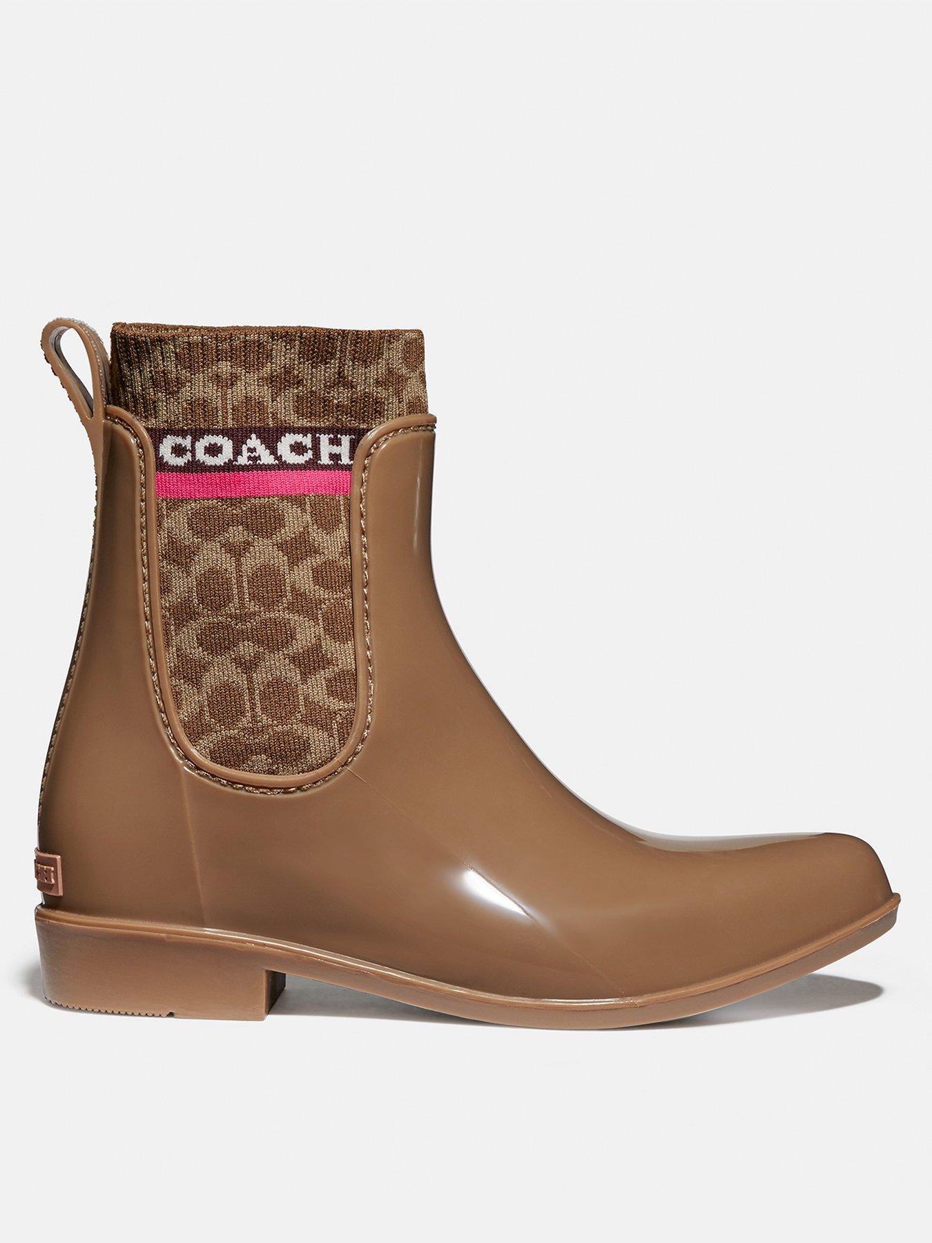 beige rain boots