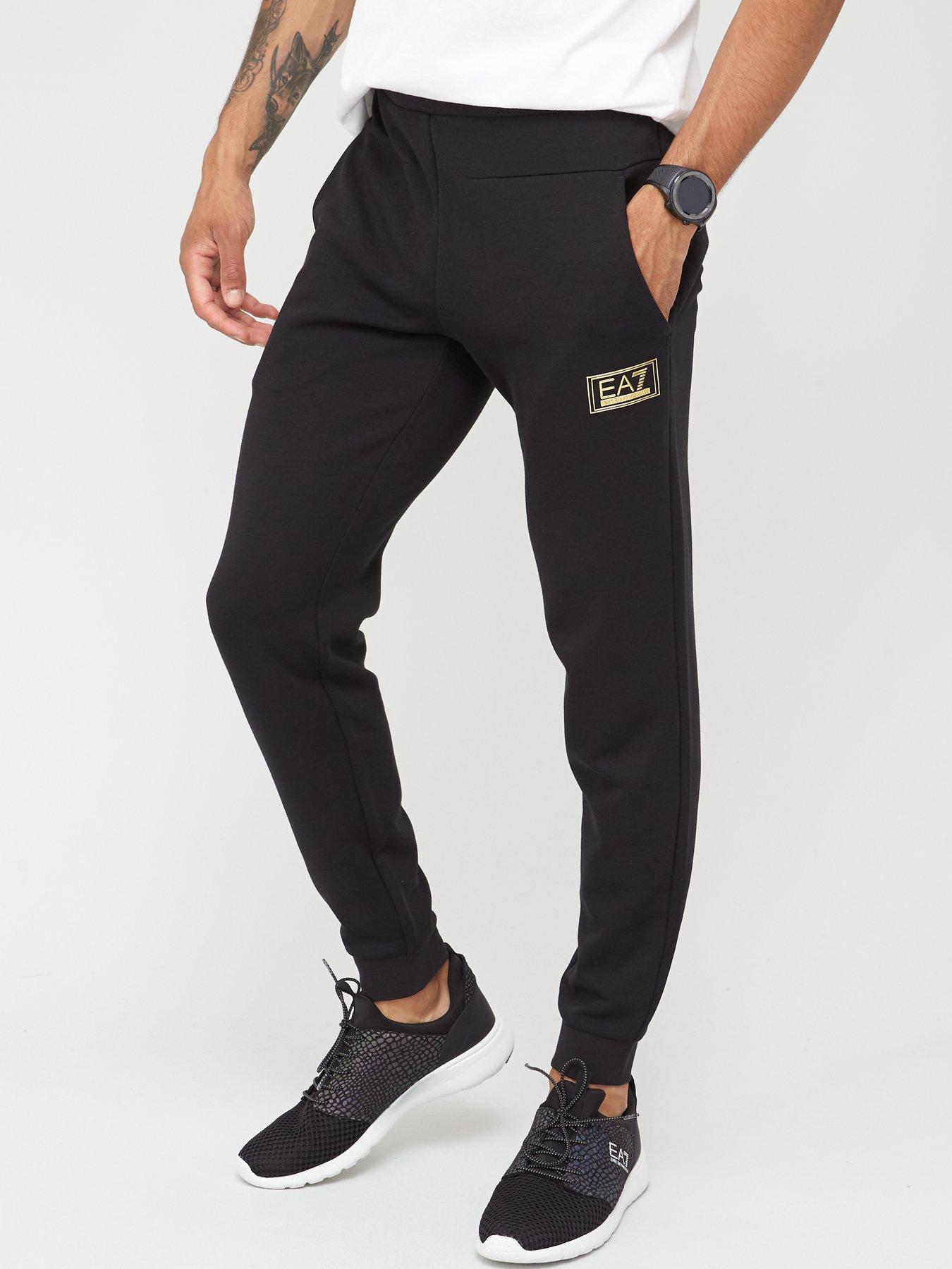 ea7 tracksuit black gold
