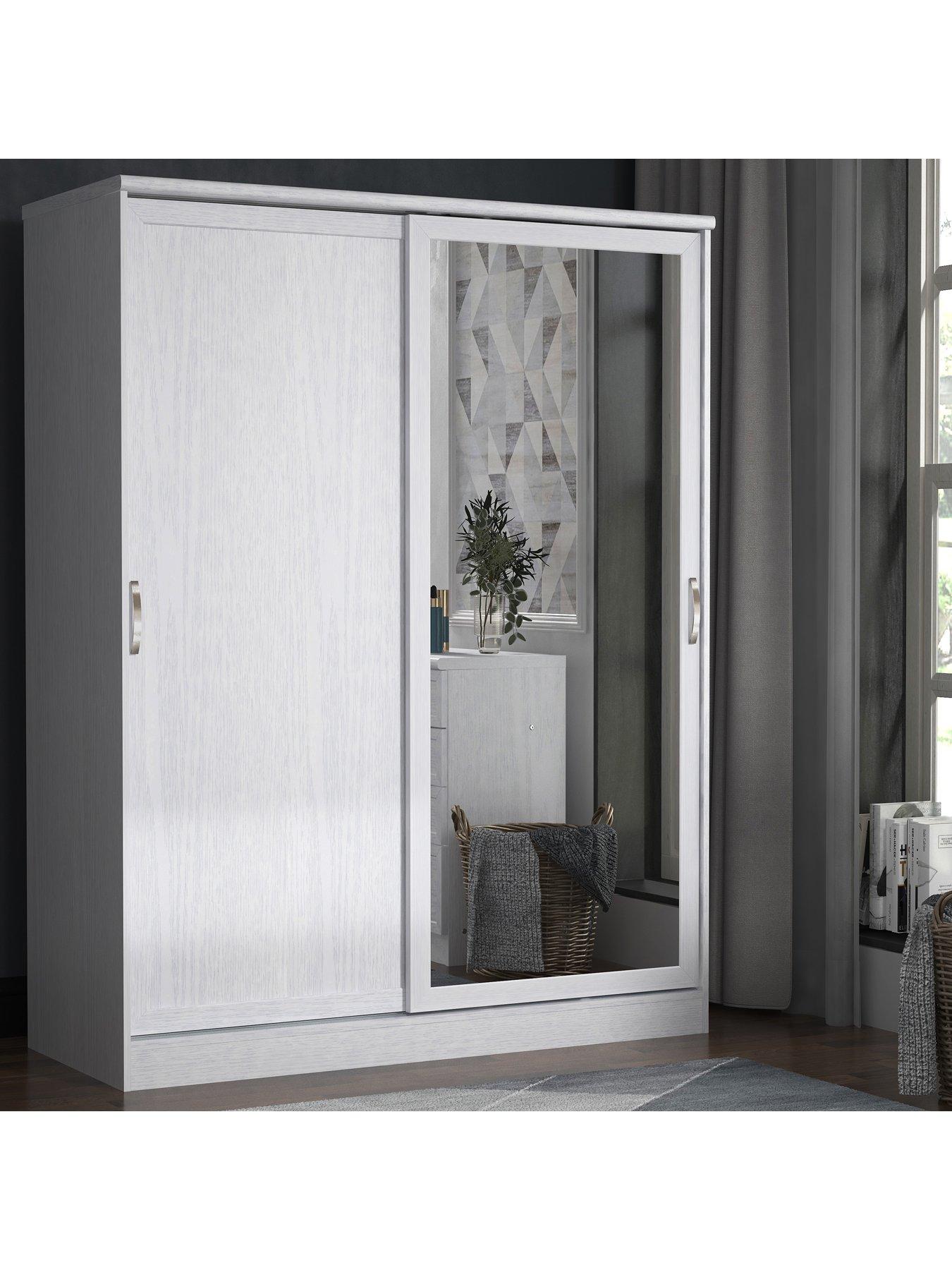 Small mirrored wardrobe with sliding doors deals
