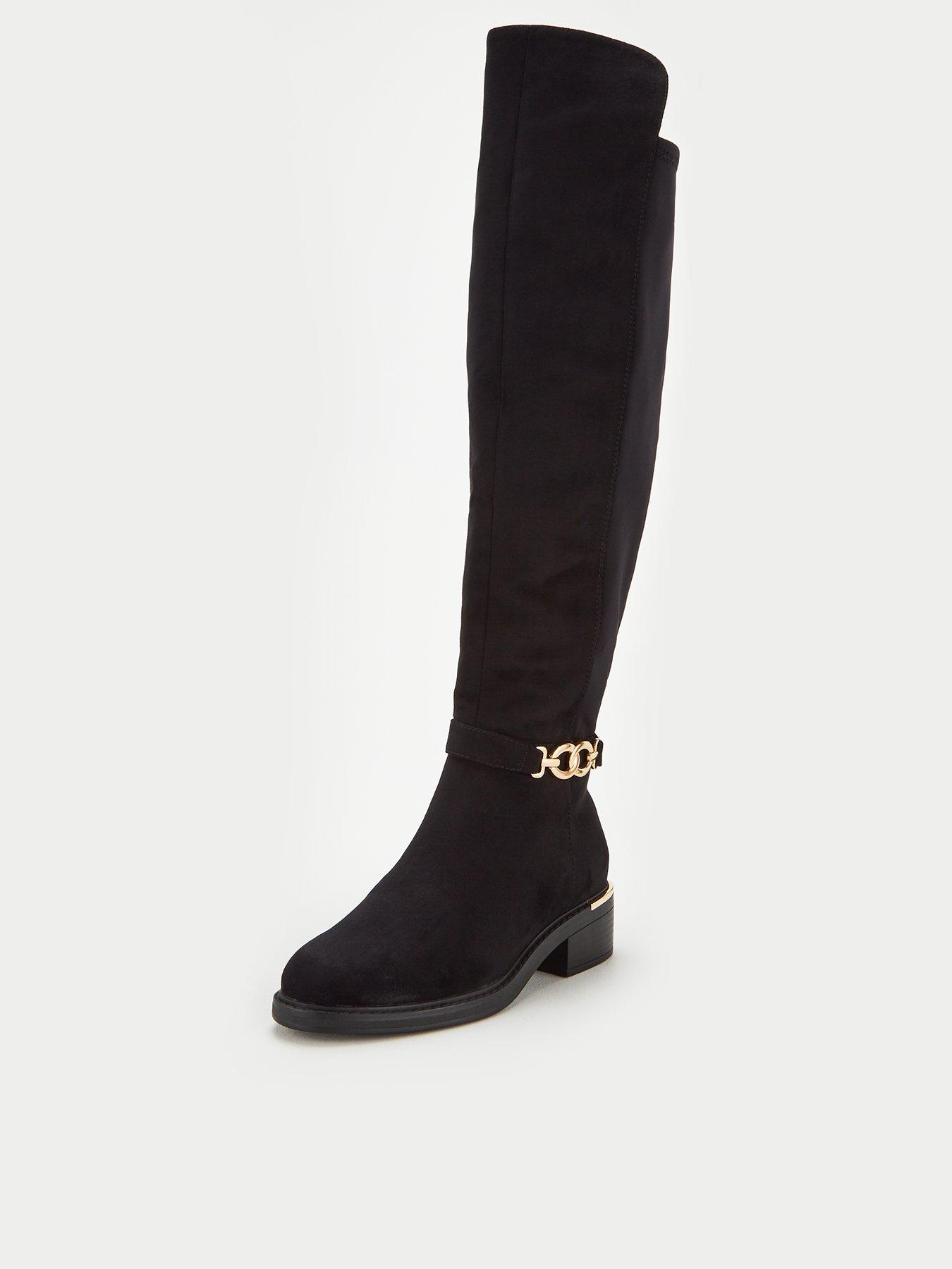 over the knee boots stretch back