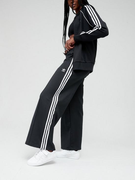 front image of adidas-originals-primebluenbsprelaxed-pants-black