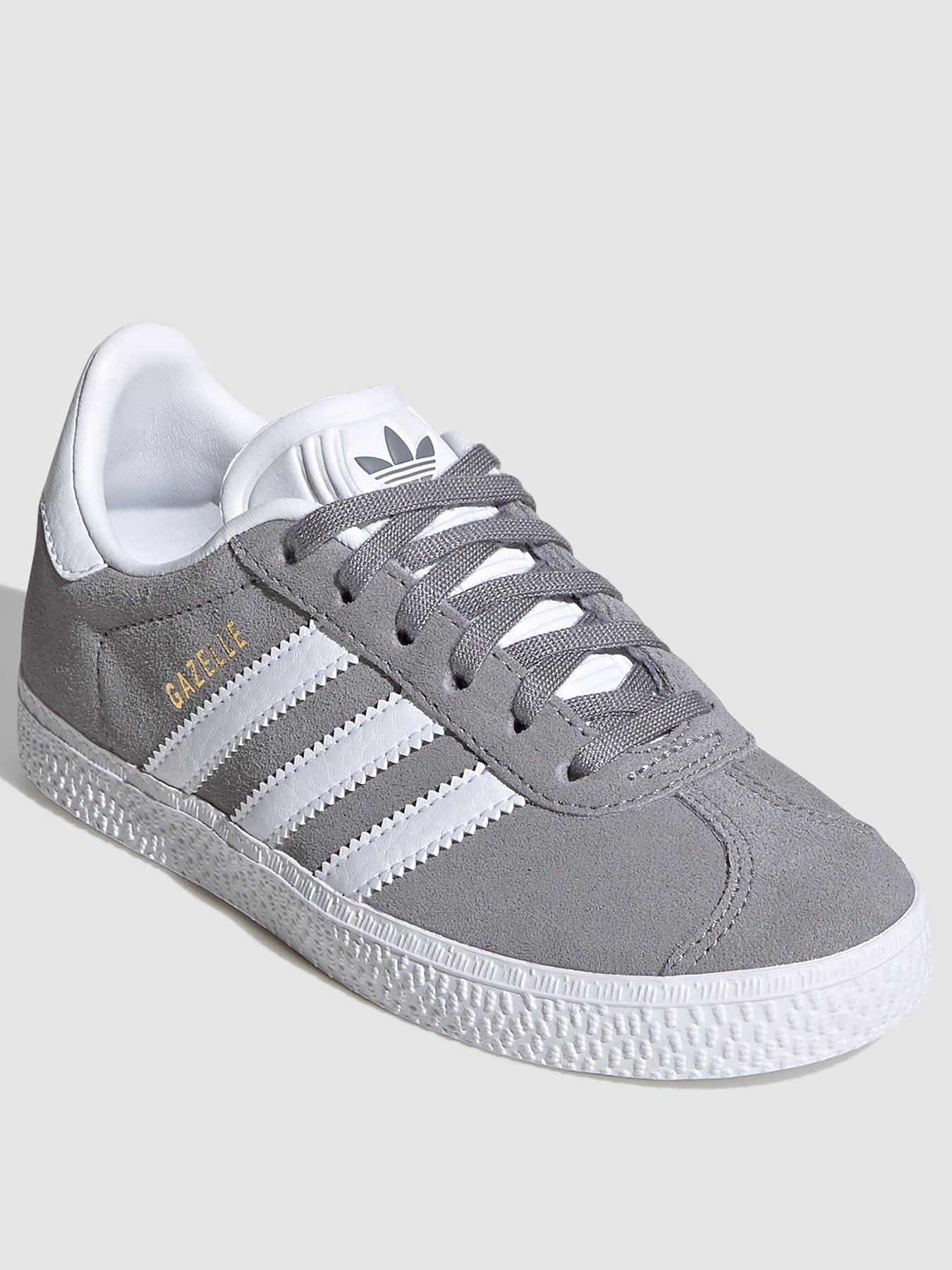 grey and white adidas trainers