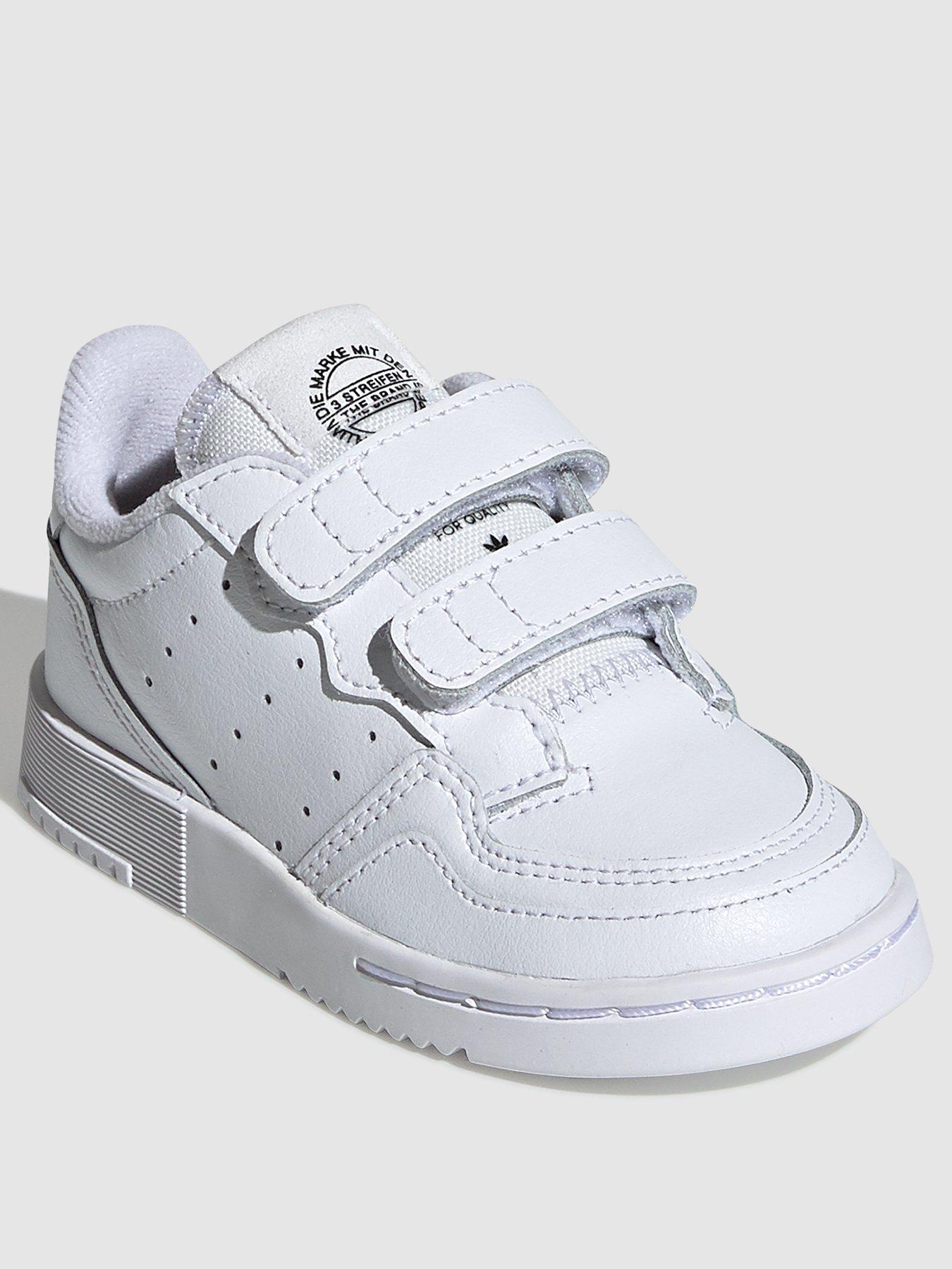 white infant trainers
