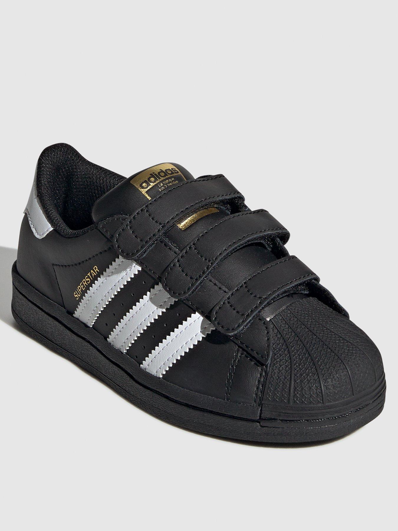 Childrens black adidas sales superstars