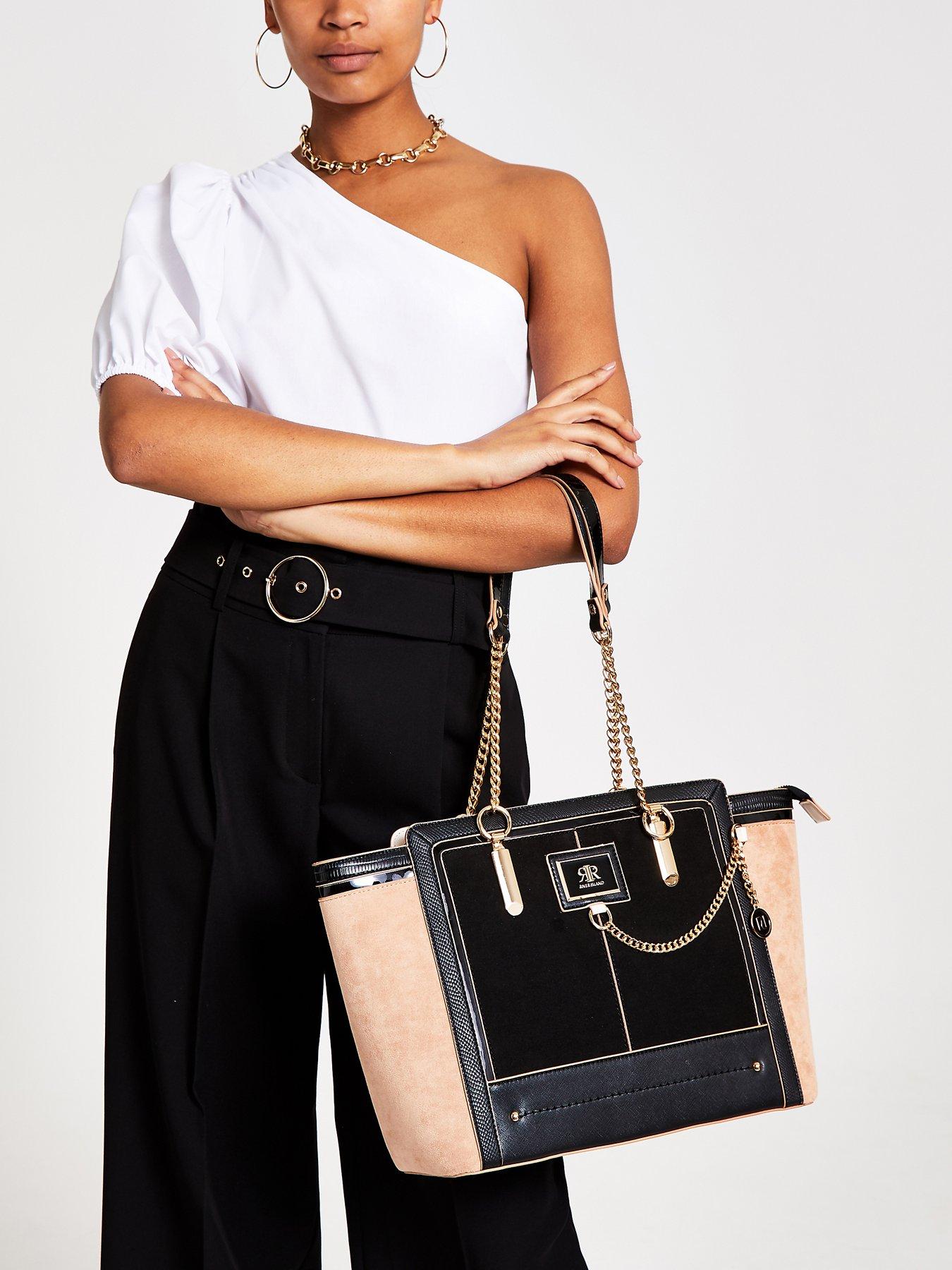 black winged chain handle tote bag