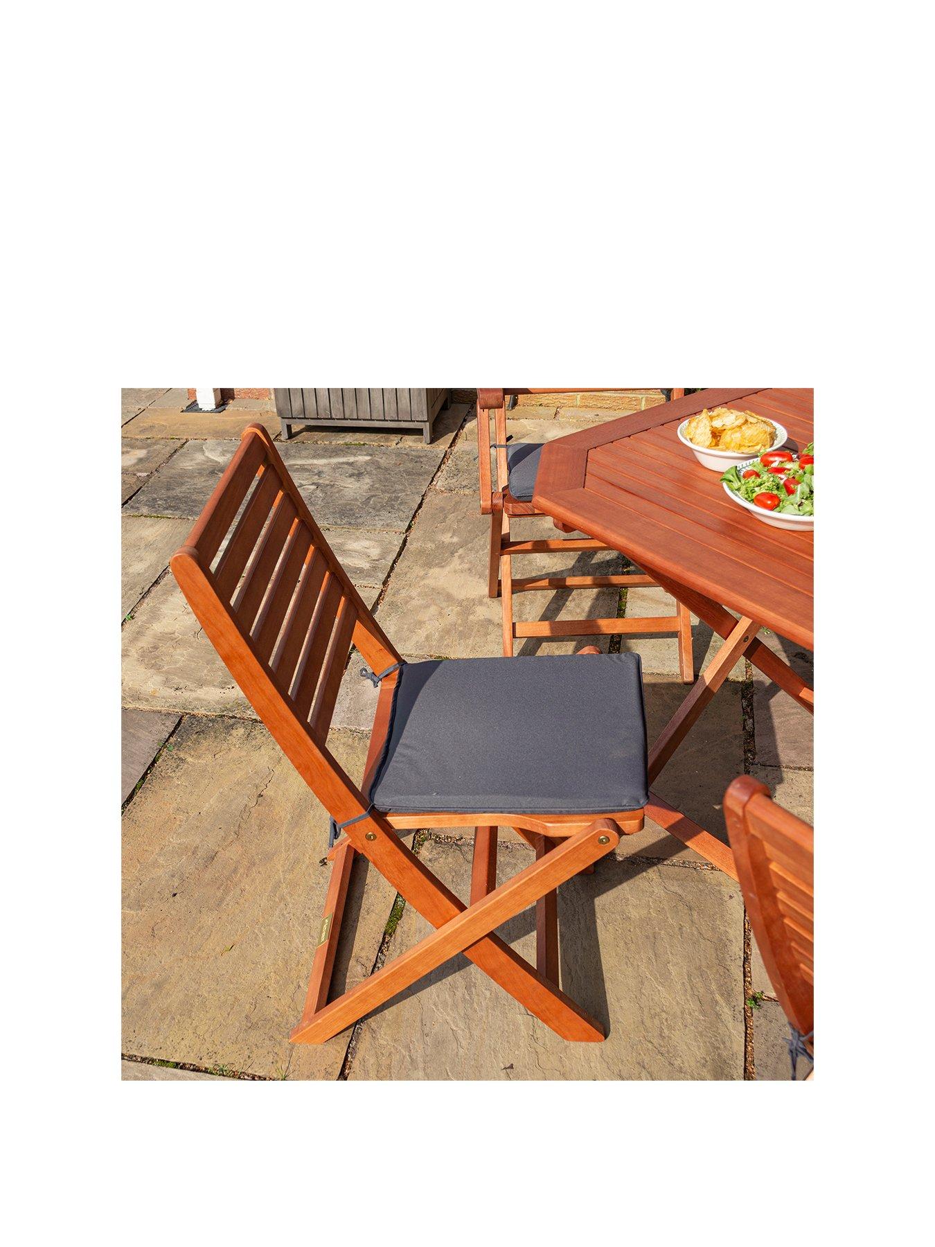 Rowlinson plumley 6 seater hardwood outlet dining set with grey cushions