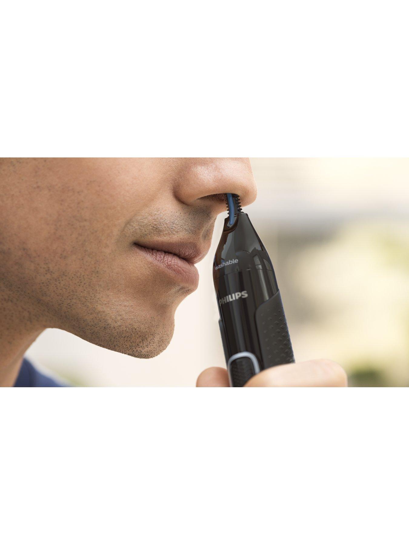 Beard trimmer with clearance nose trimmer