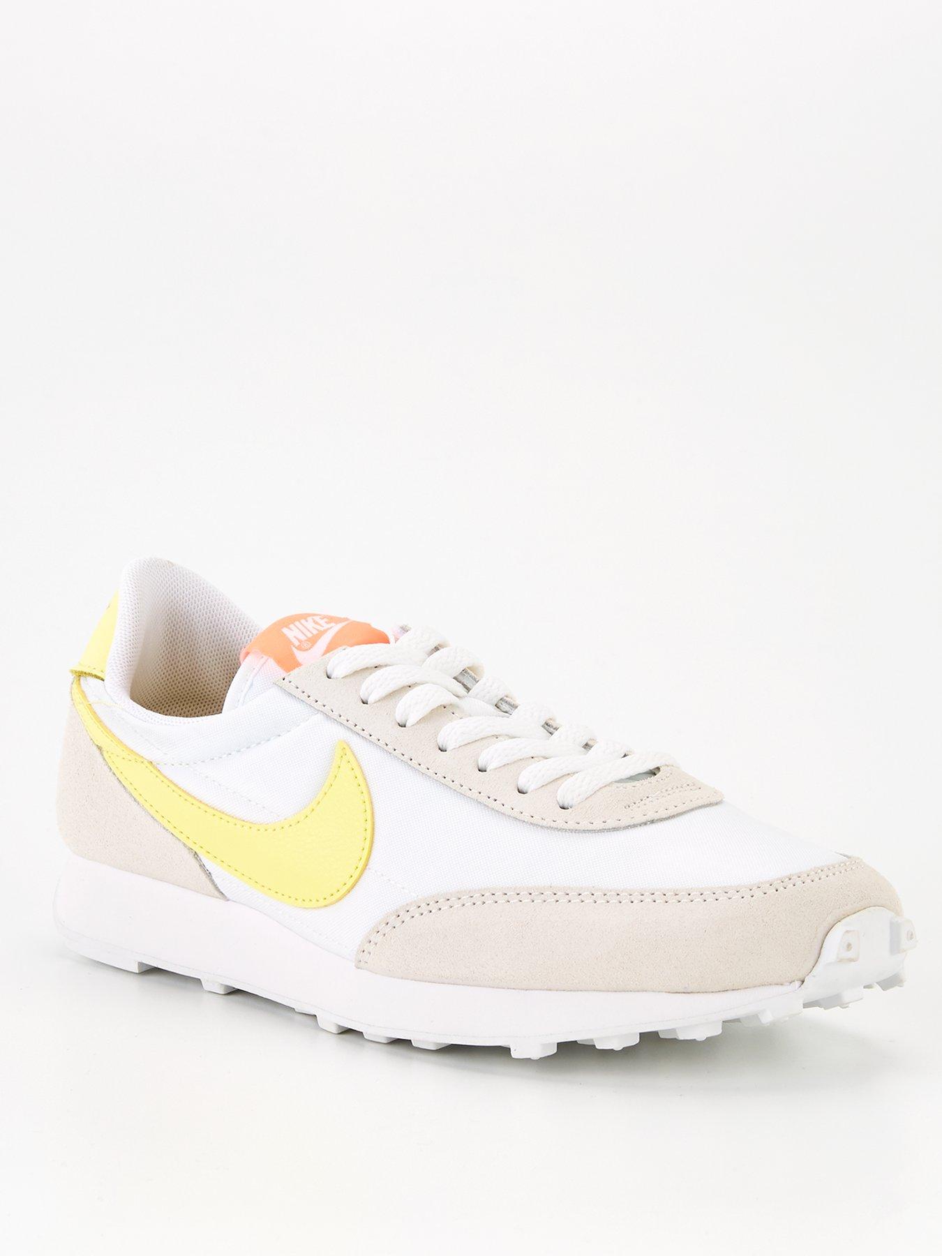 white and yellow nike trainers