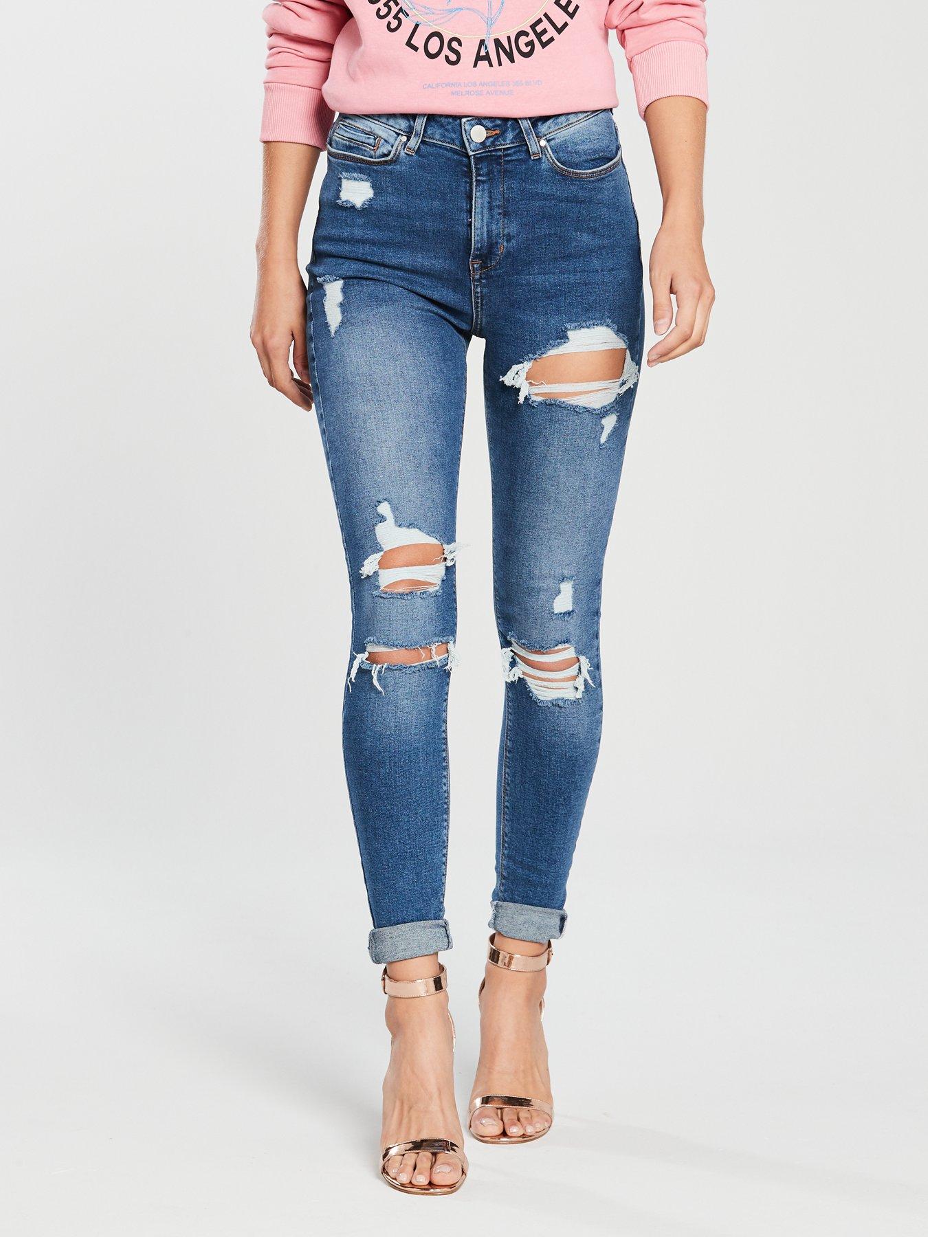 female ripped skinny jeans