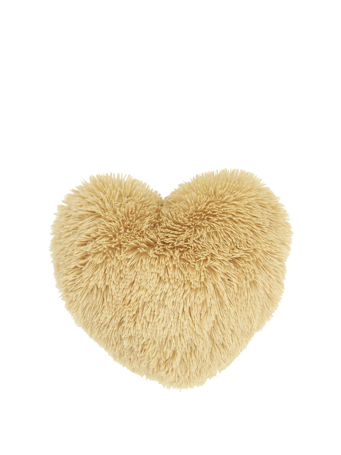 yellow furry pillow